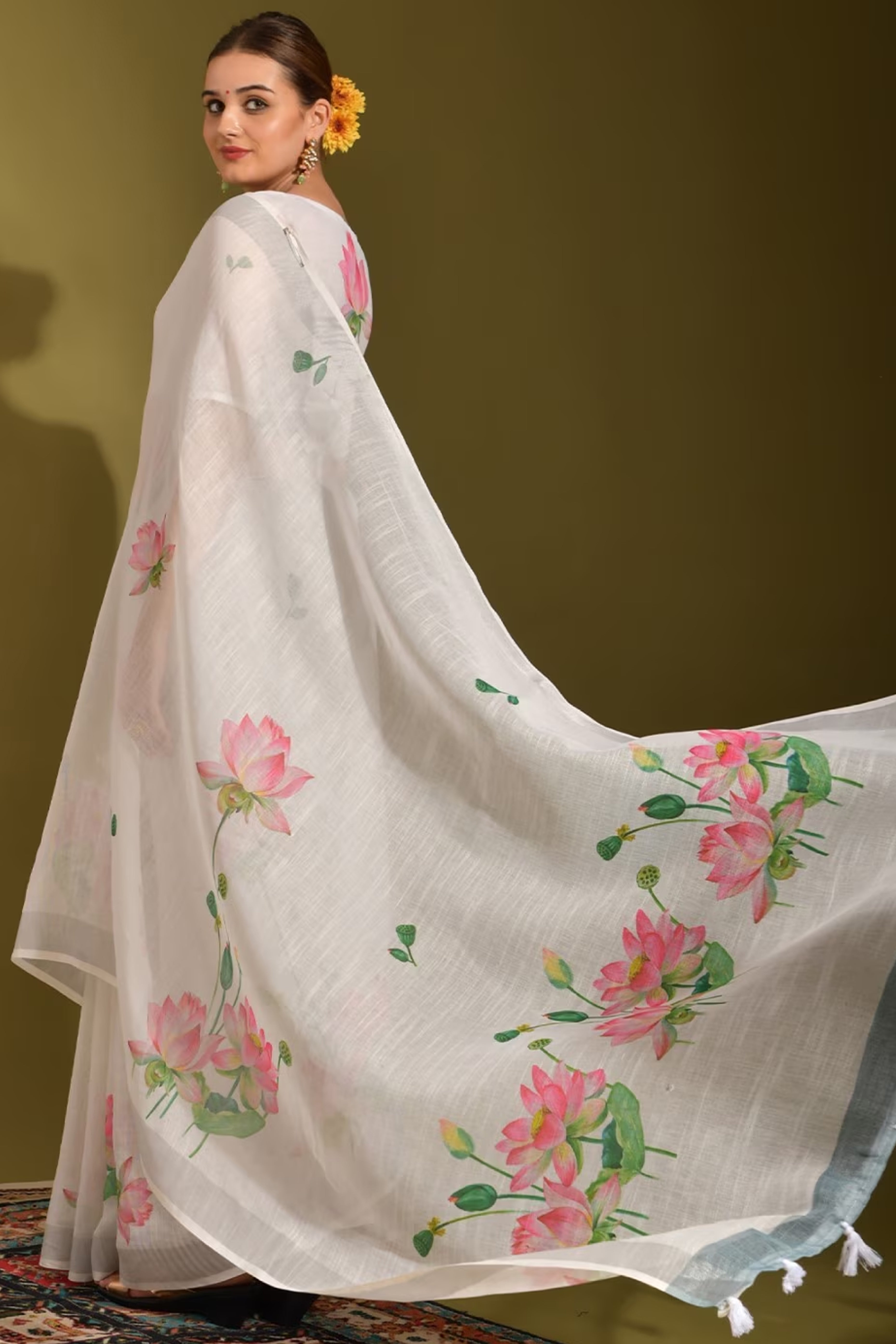Ethereal White Linen Saree with Floral Print & Tassel Detail