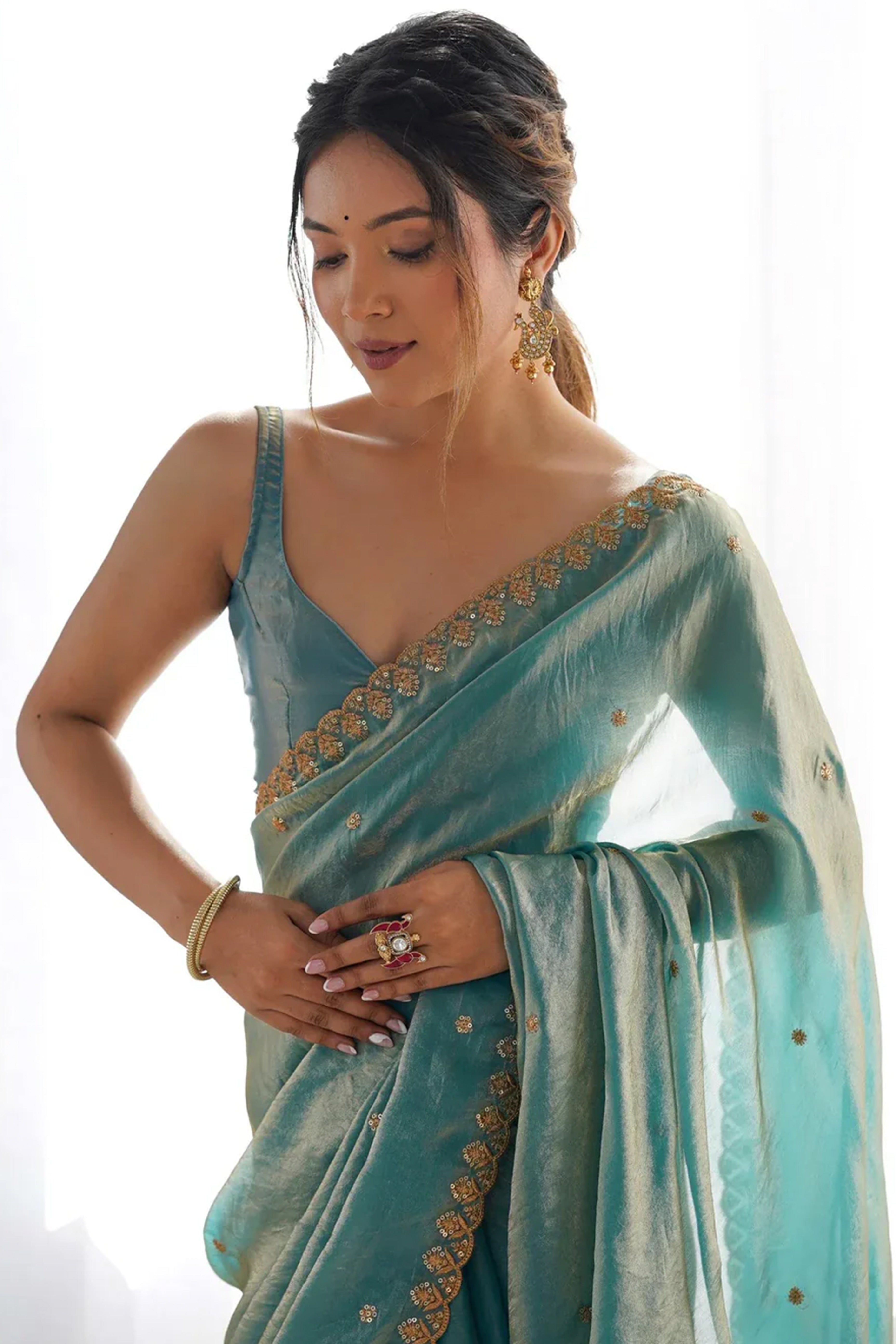 Stunning Turquoise Organza Satin Silk Saree Adorned With Floral Sequin Zari Embroidery Work