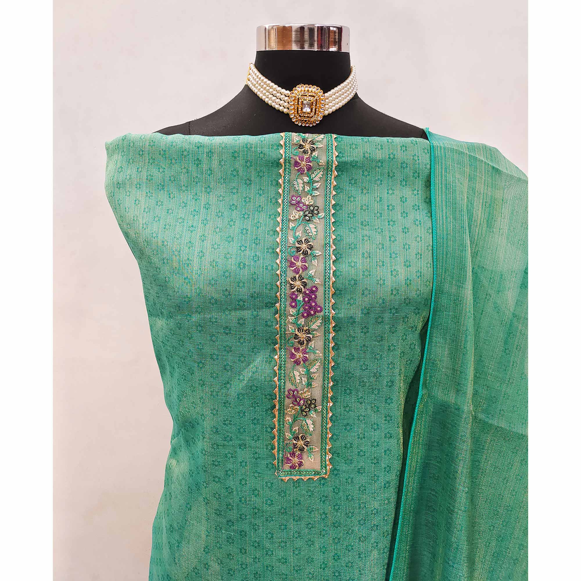 Green Art Silk Dress Material Adorned with Soft Floral Prints for a Regal Ethnic Touch