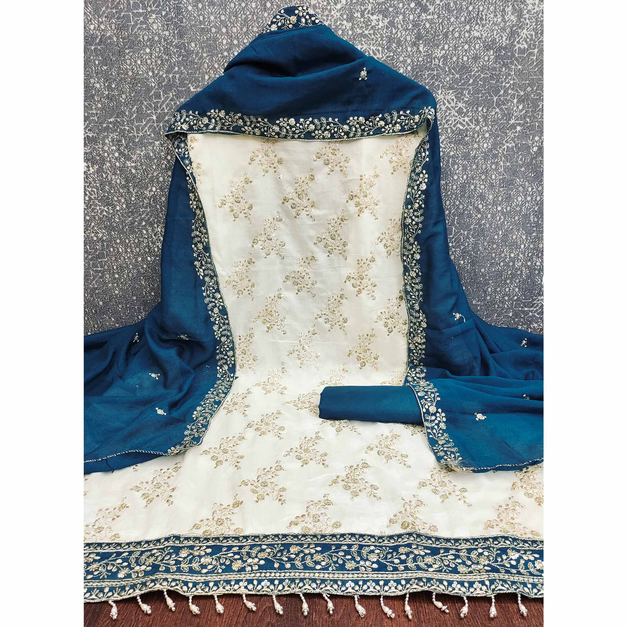 Teal and Off White Vichitra Silk Fabric with Embroidered Detailing