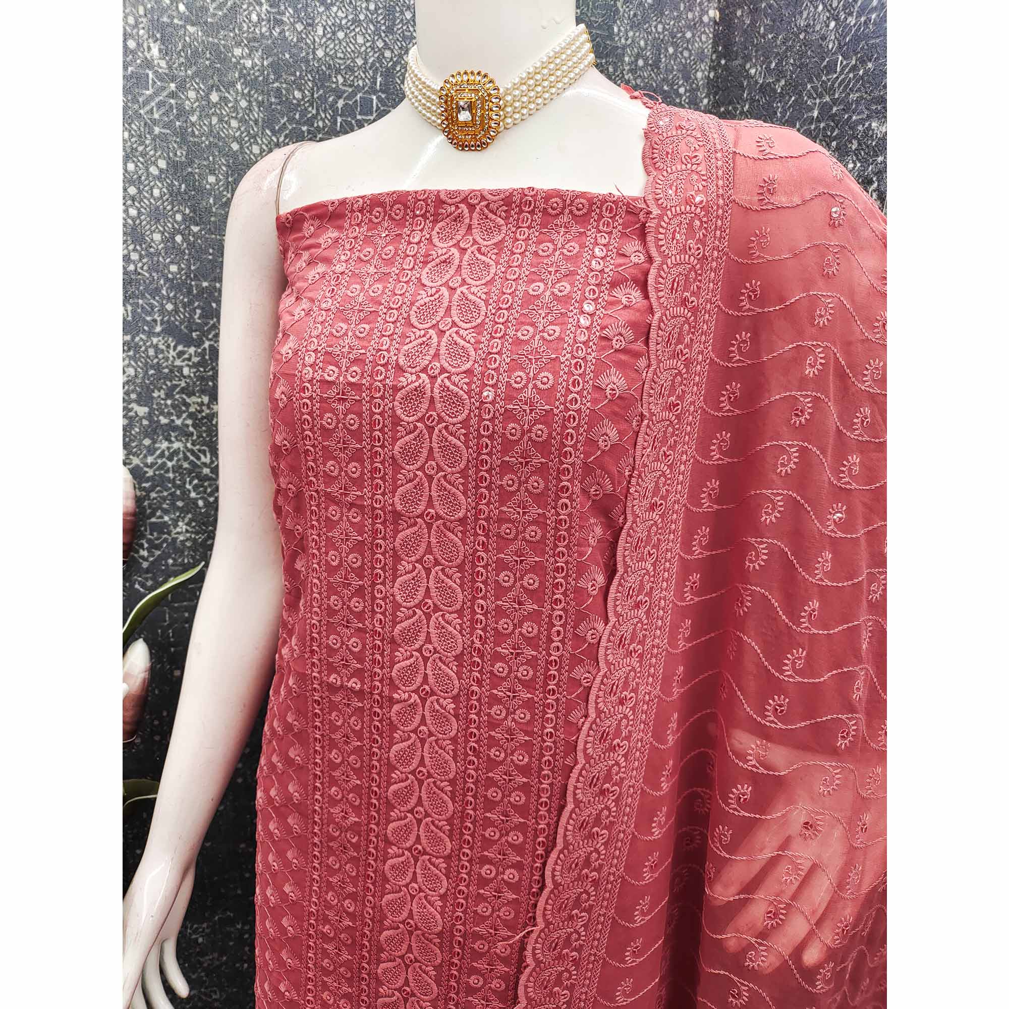 Lightweight Peach Georgette Dress Material Adorned with Beautiful Floral Embroidery