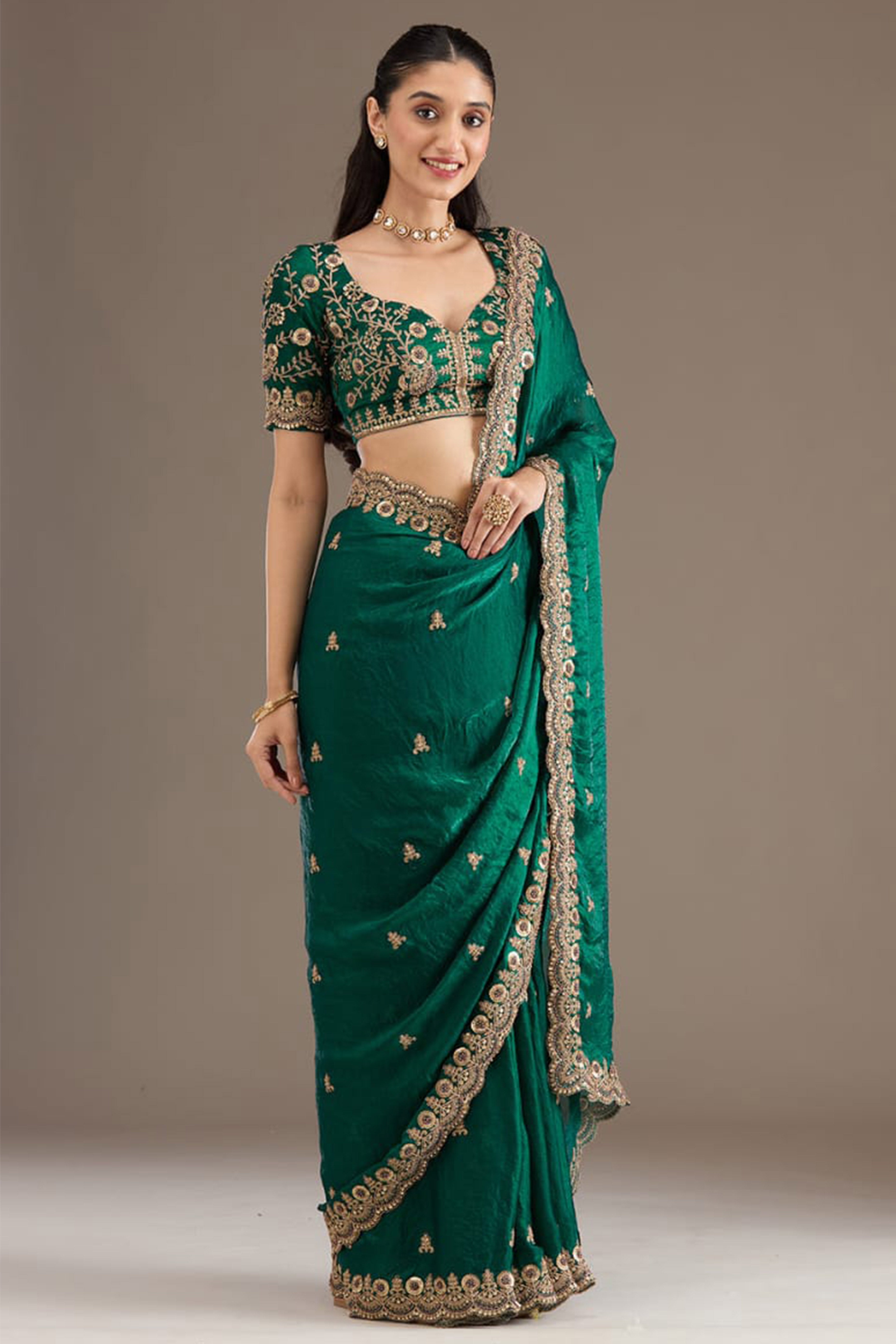 Trendy Green Fancy Satin Saree Enhanced With Rich Golden Embroidered Design
