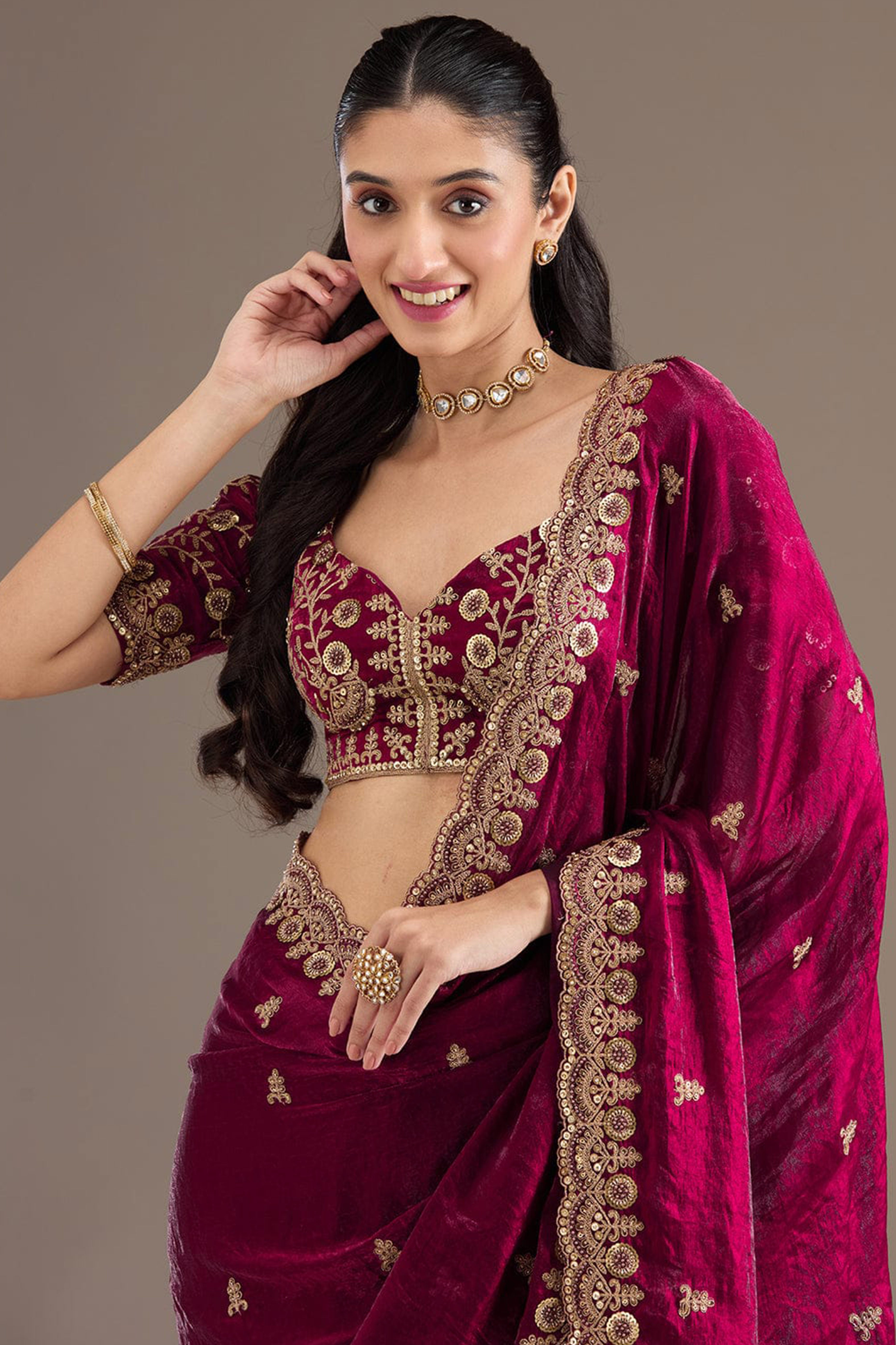 Trendy Rani Pink Fancy Satin Saree Enhanced With Rich Golden Embroidered Design