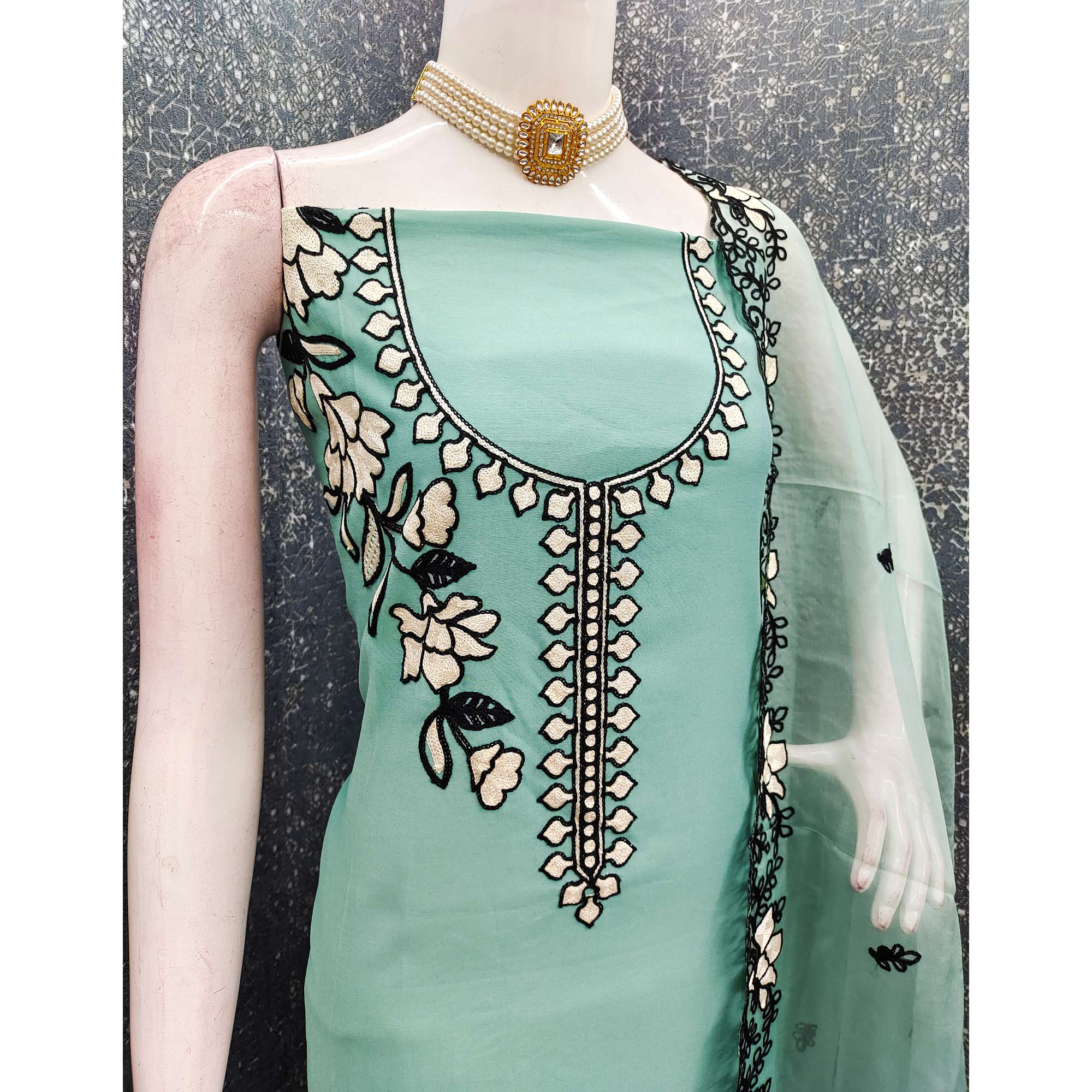 Graceful Turquoise Floral Viscose Dress Material Enhanced With Intricate Thread Embroidery Work