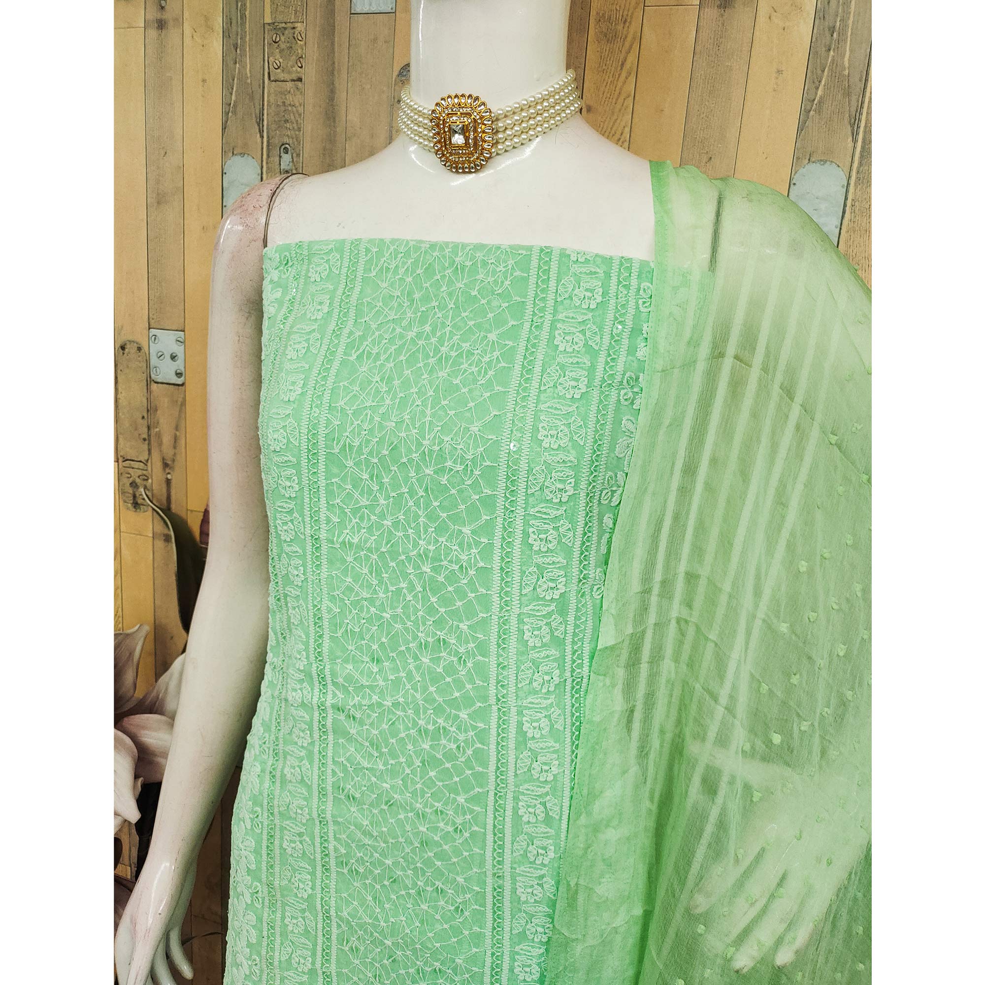 Elegant Green Floral Embroidered Georgette Dress Material With Delicate Sequins Accents
