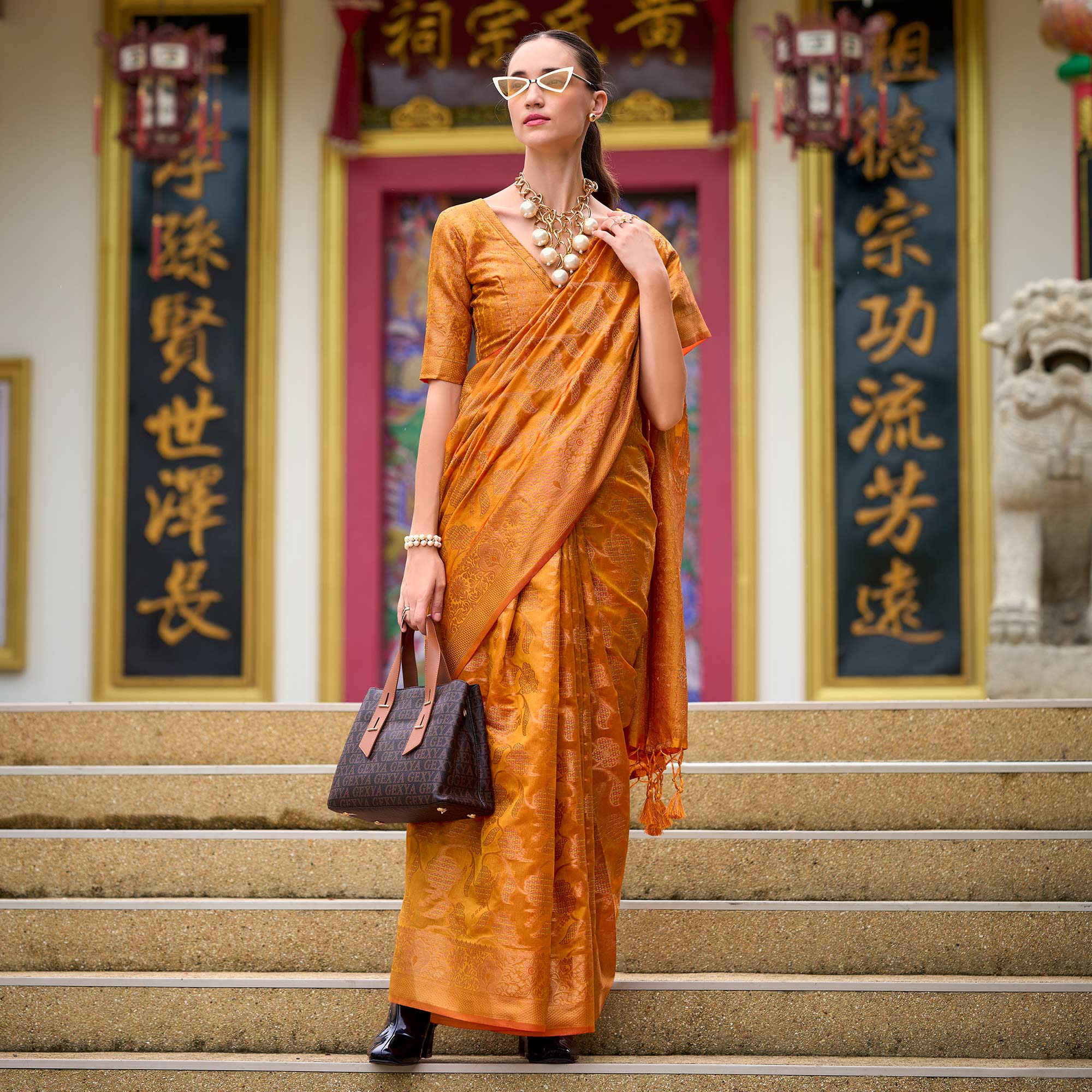 Warm Orange Floral Motifs Woven Organza Saree