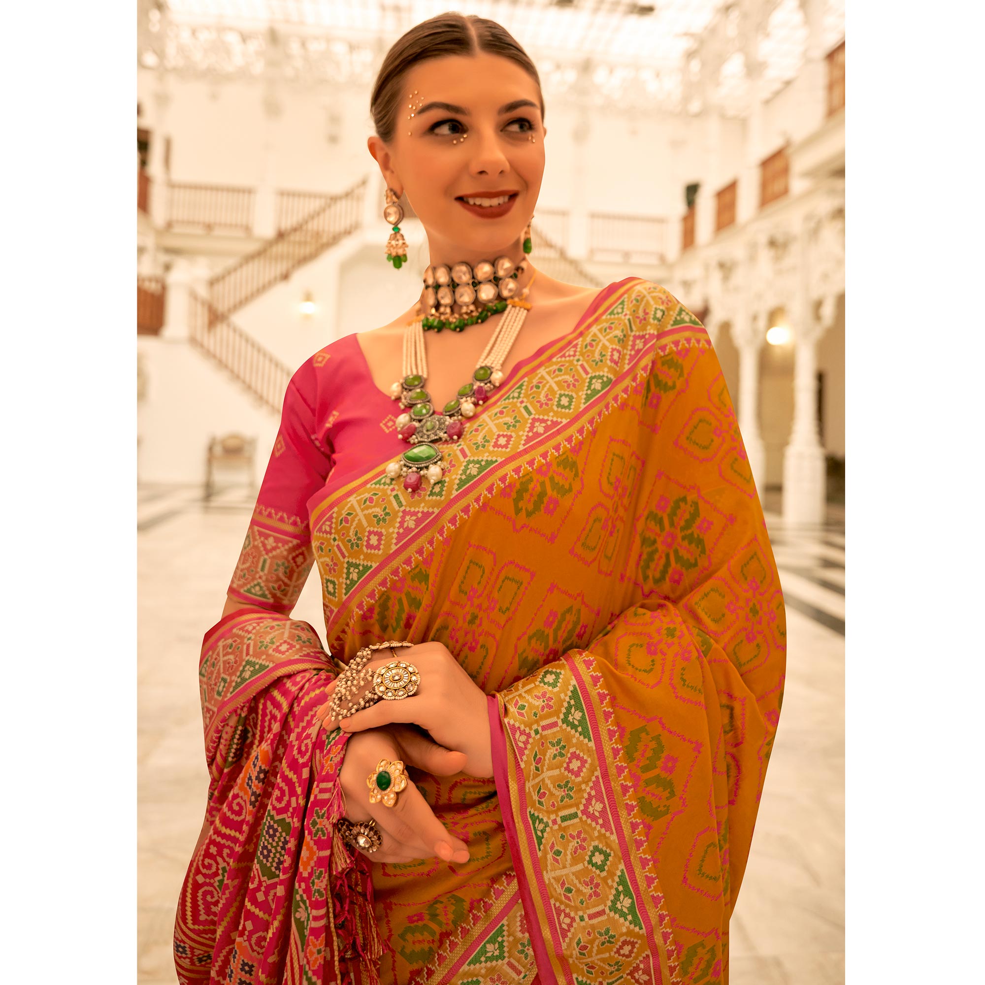 Mustard Patola Printed Banarasi Silk Saree With Tassels