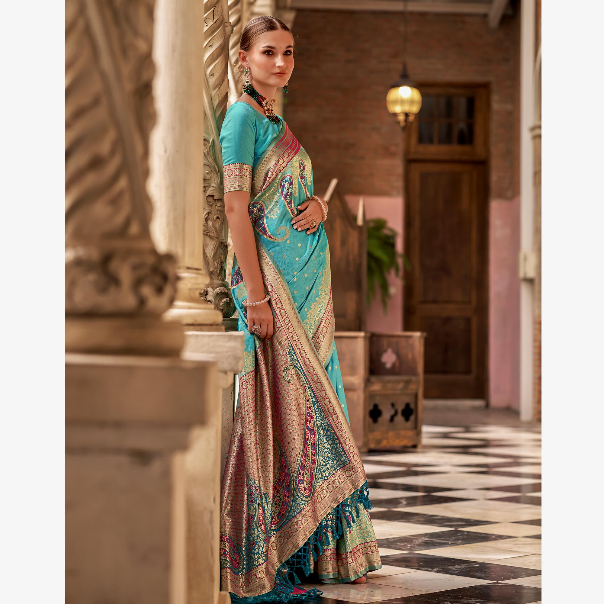 Turquoise Floral Woven Banarasi Silk Saree With Tassels