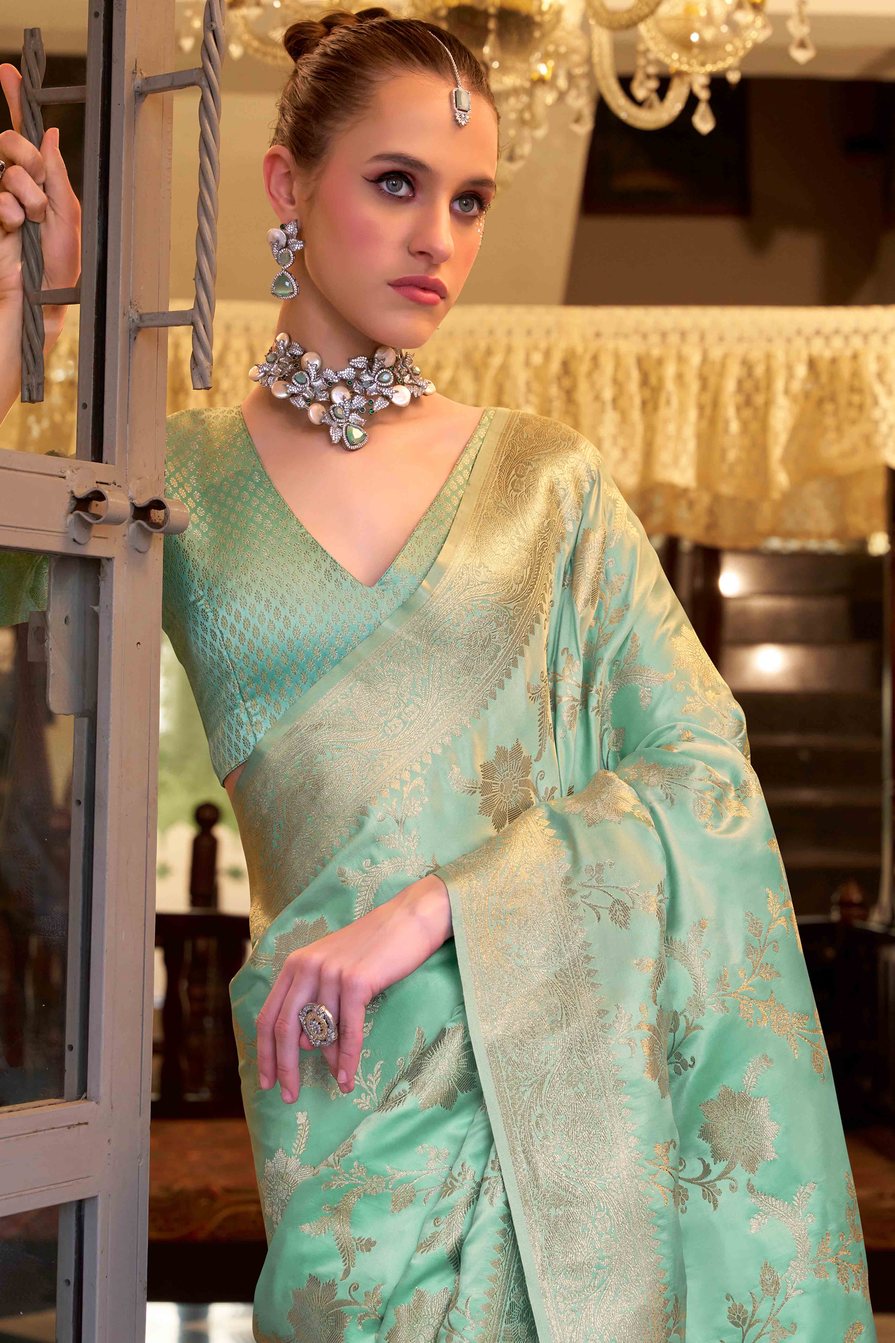 Mint Green Soft Satin Saree Featuring Exquisite Zari Weaving Work