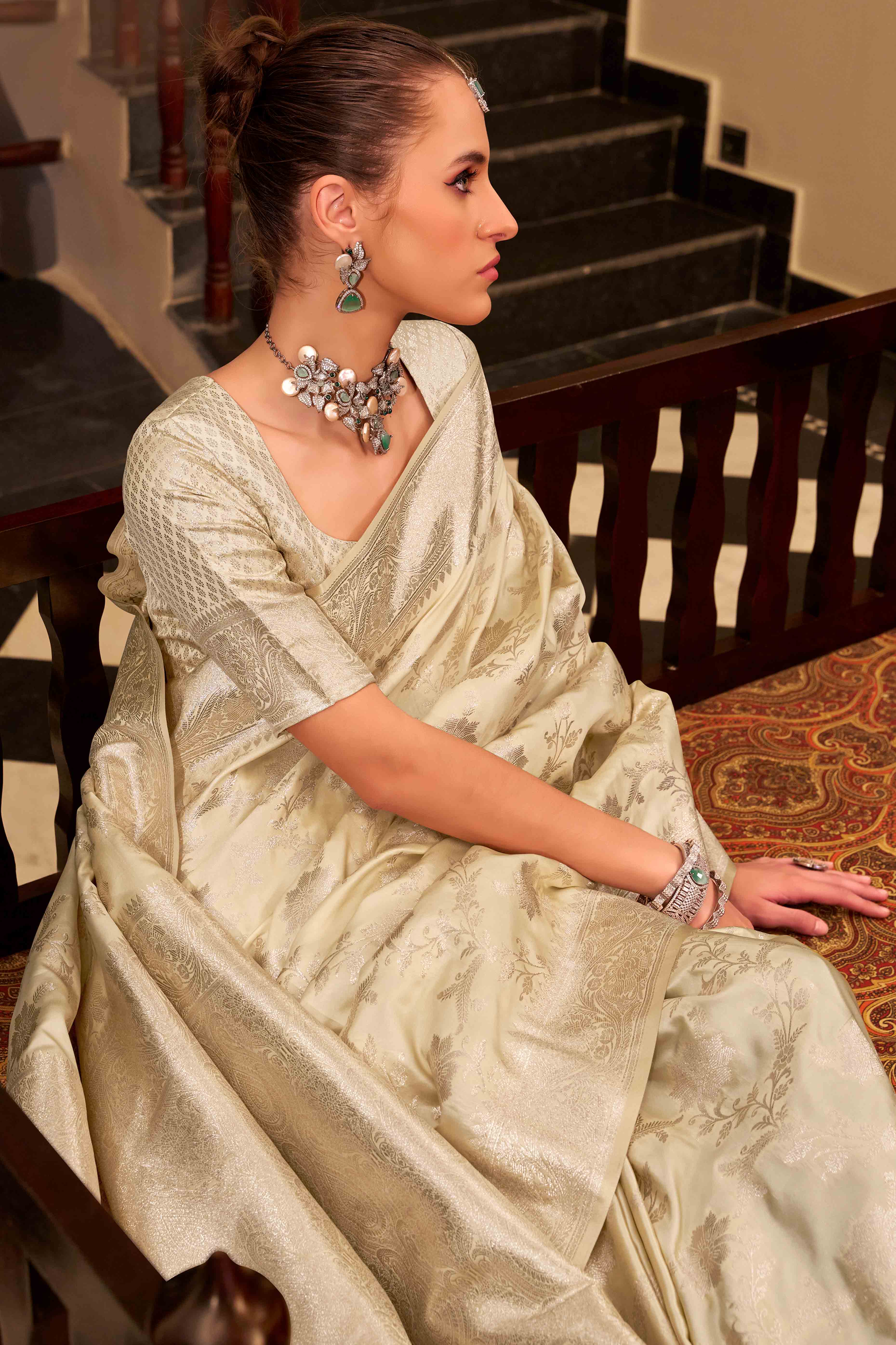 Off White Soft Satin Saree Featuring Exquisite Zari Weaving Work