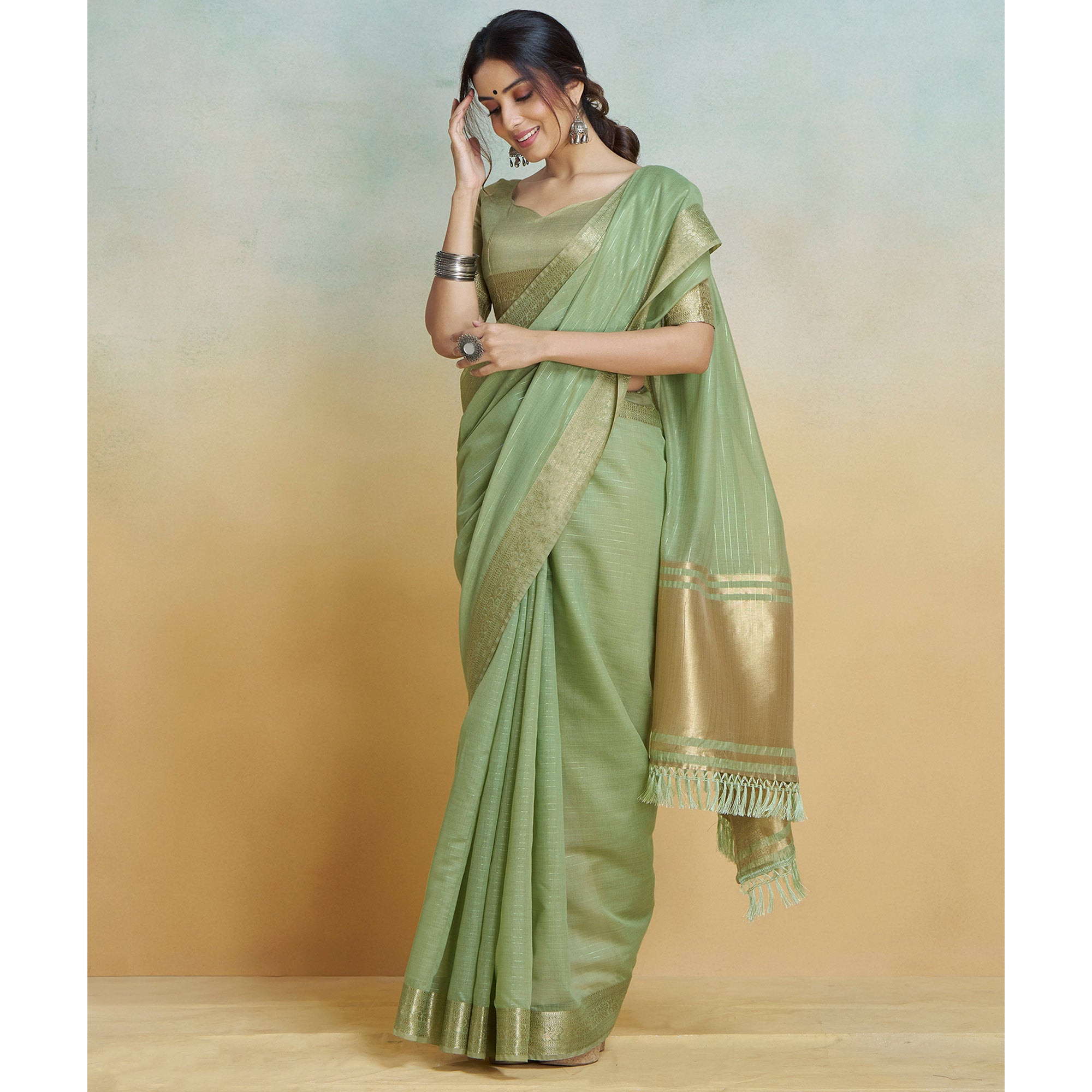 Green Woven Cotton Silk Saree With Tassels