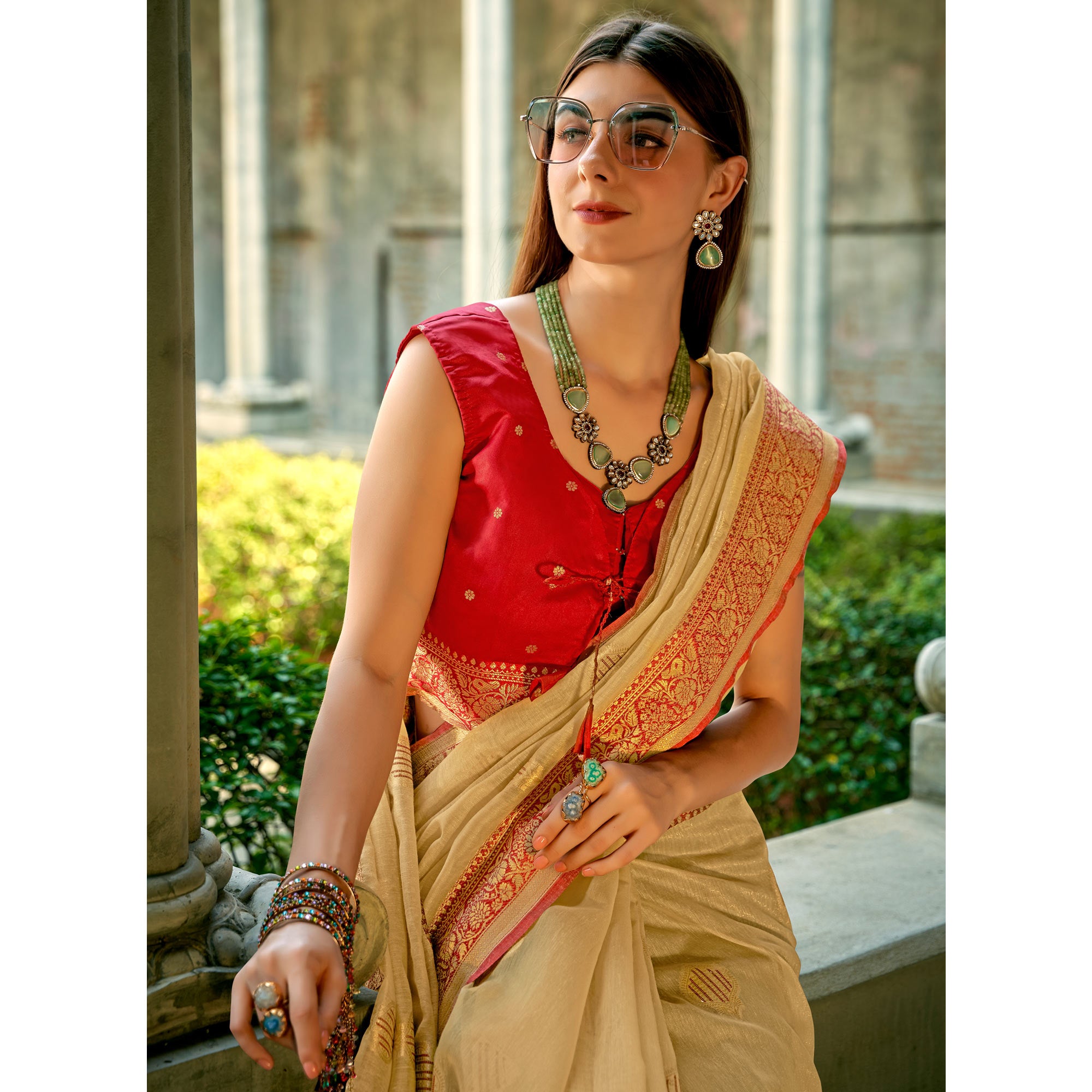 Chikoo Floral Woven Tissue Silk Saree With Tassels