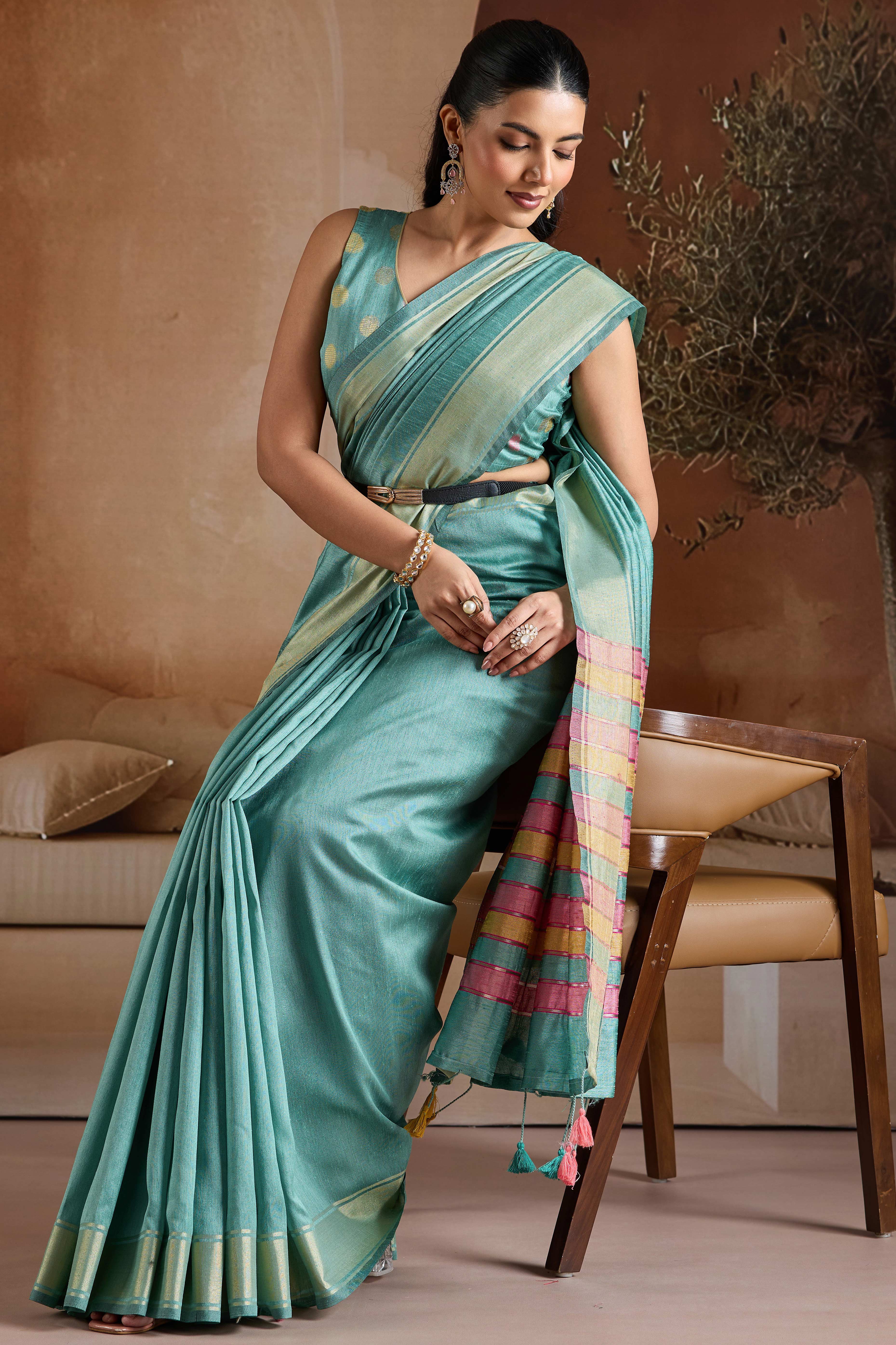 Graceful Turquoise Zari Woven Bhagalpuri Silk Saree Accented With Tassel Pallu