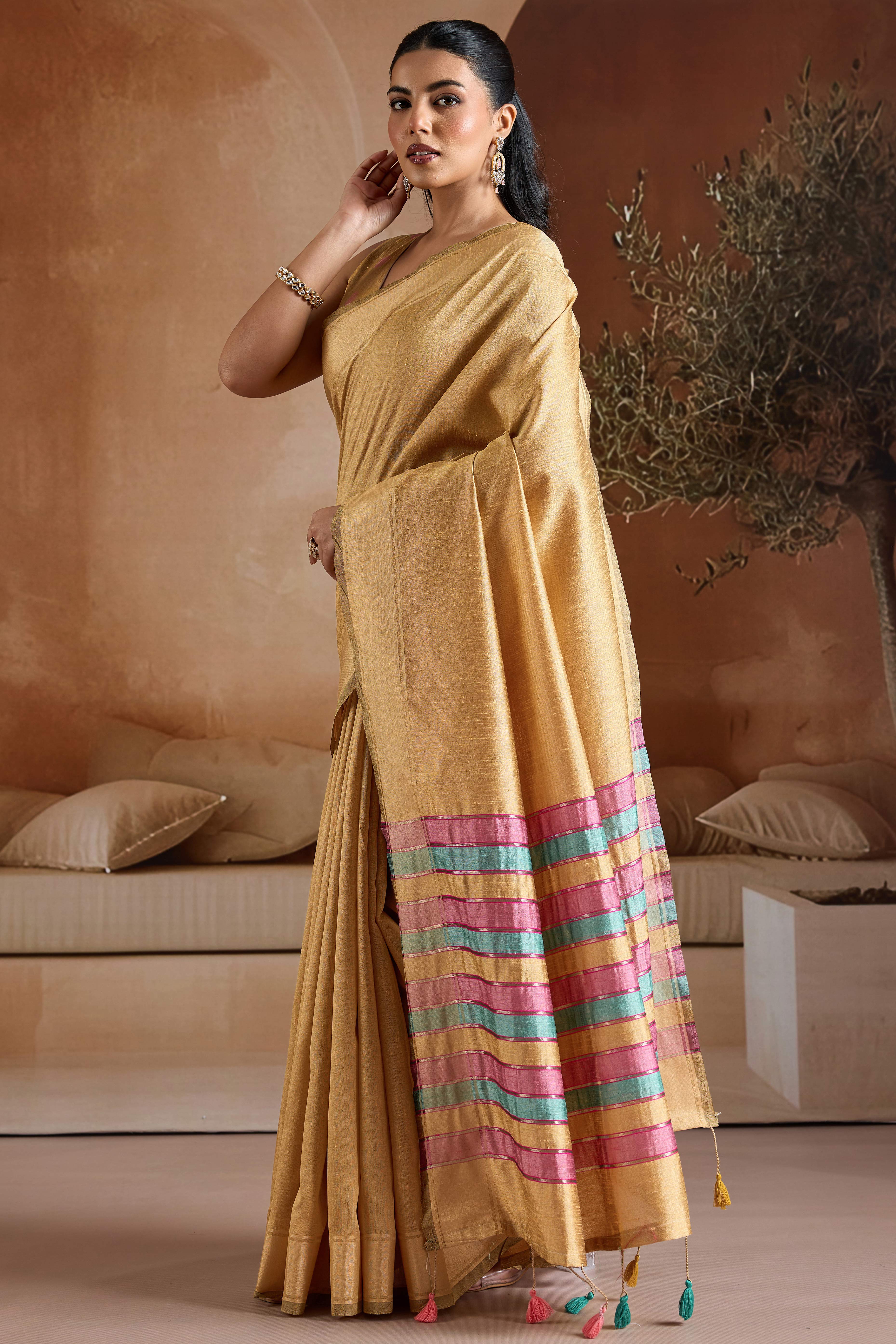 Graceful Chikoo Zari Woven Bhagalpuri Silk Saree Accented With Tassel Pallu