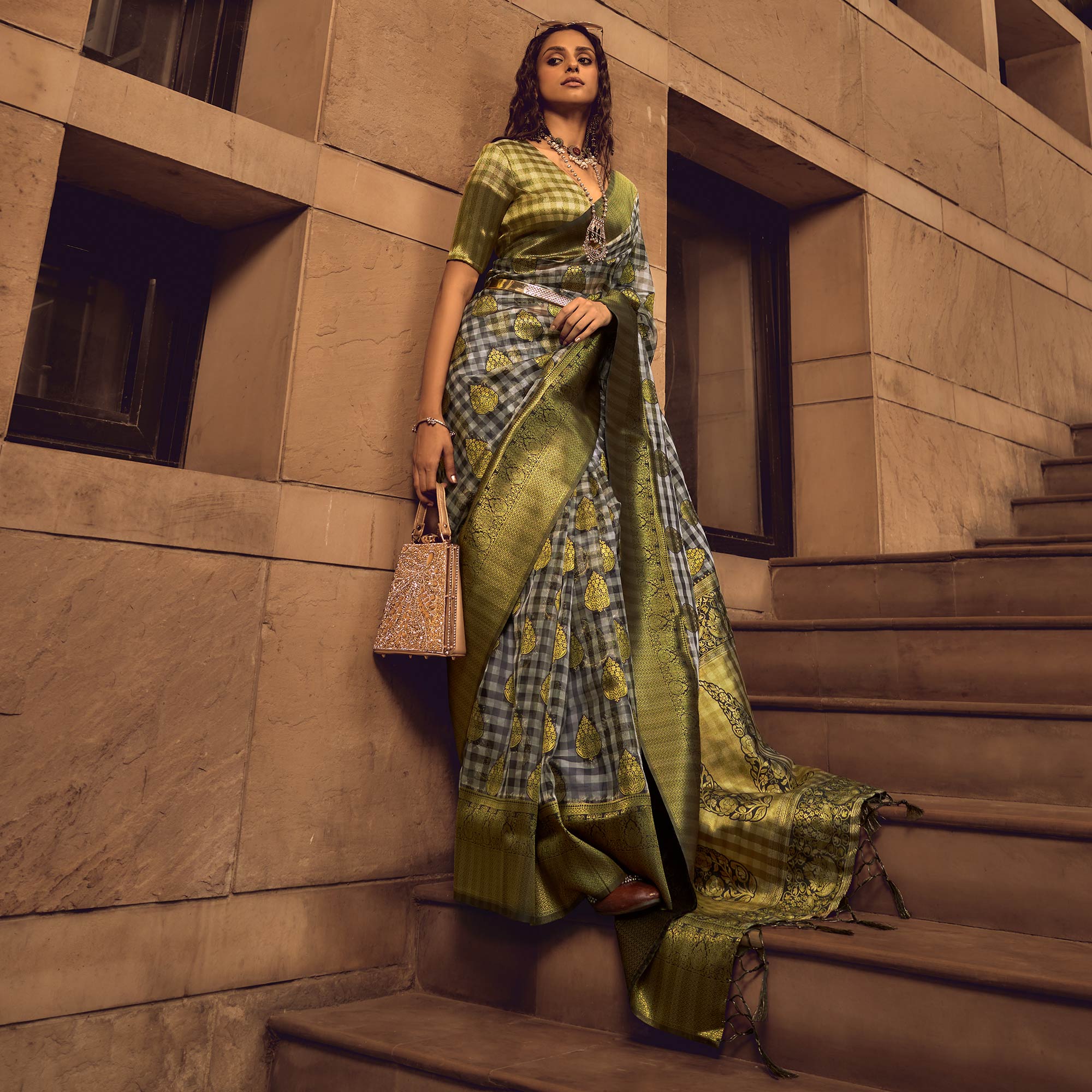 Black Checks Woven Organza Saree With Tassels