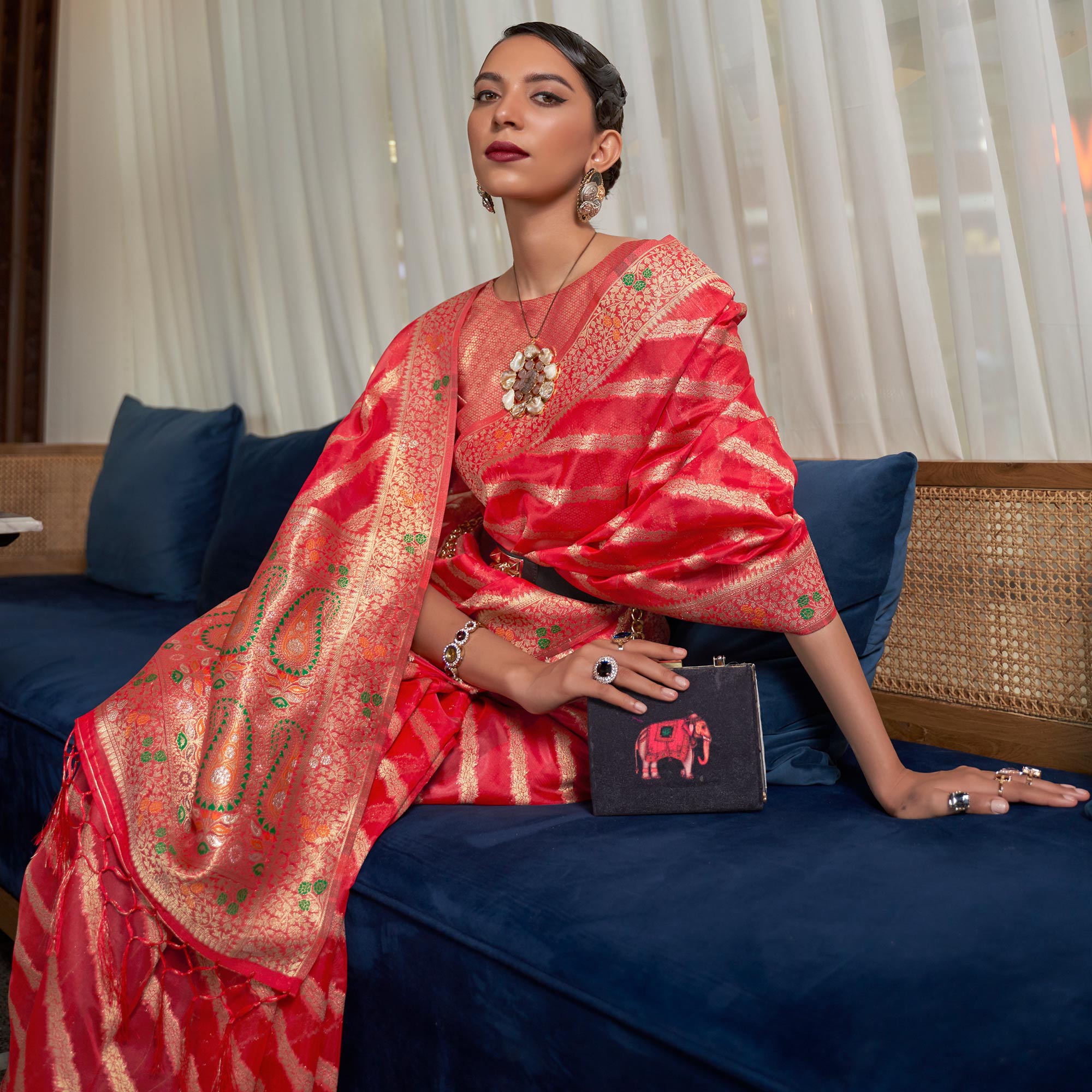 Red Woven Organza Saree With Tassels