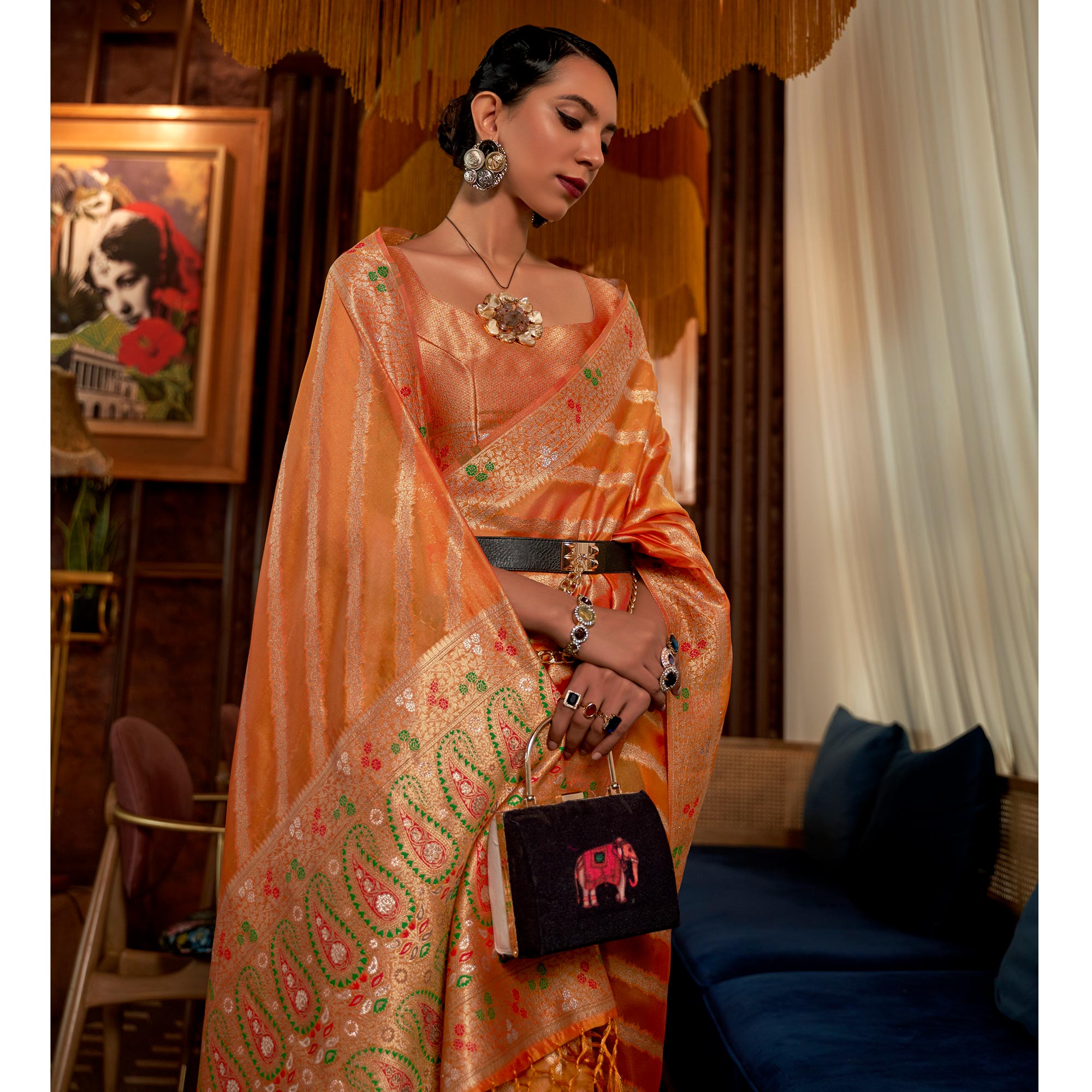 Orange Woven Organza Saree With Tassels