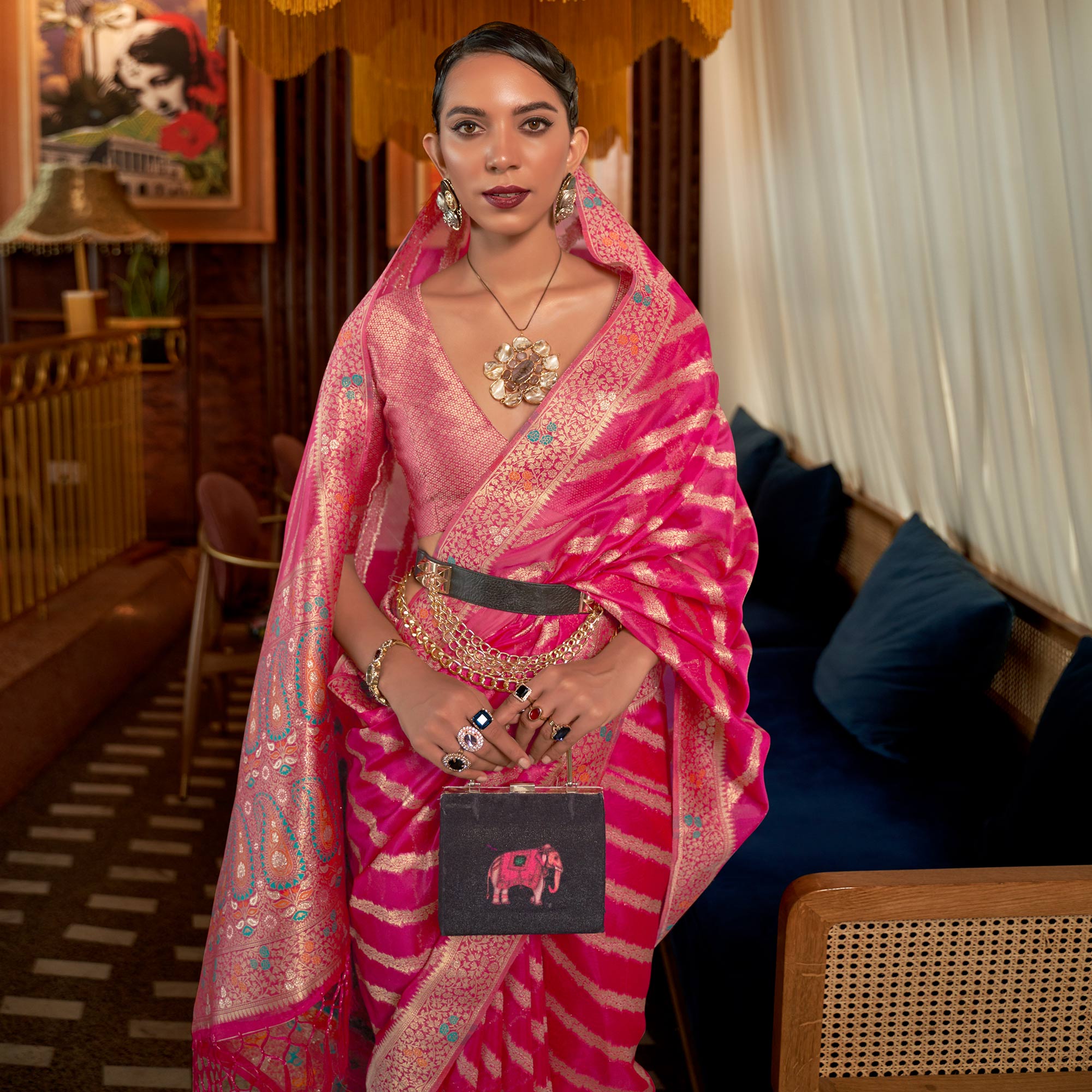 Pink Woven Organza Saree With Tassels