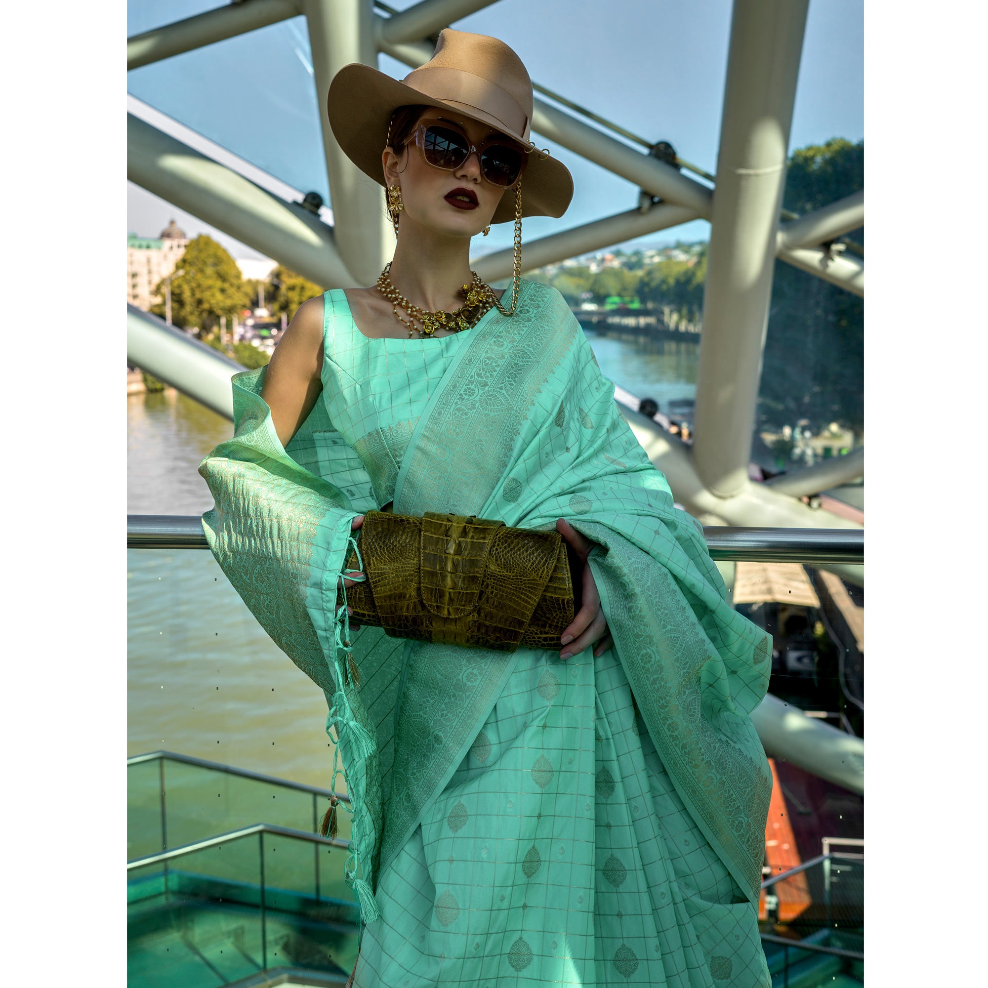 Turquoise Woven Art Silk Saree With Tassels