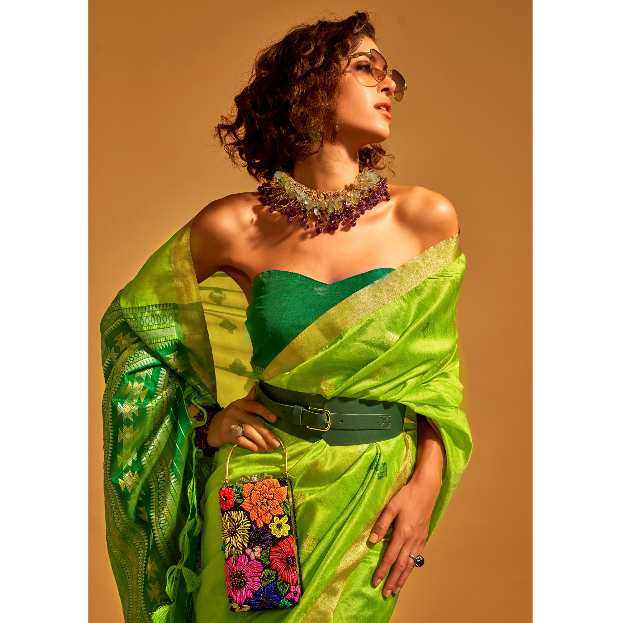 Green Woven Art Silk Saree With Tassels