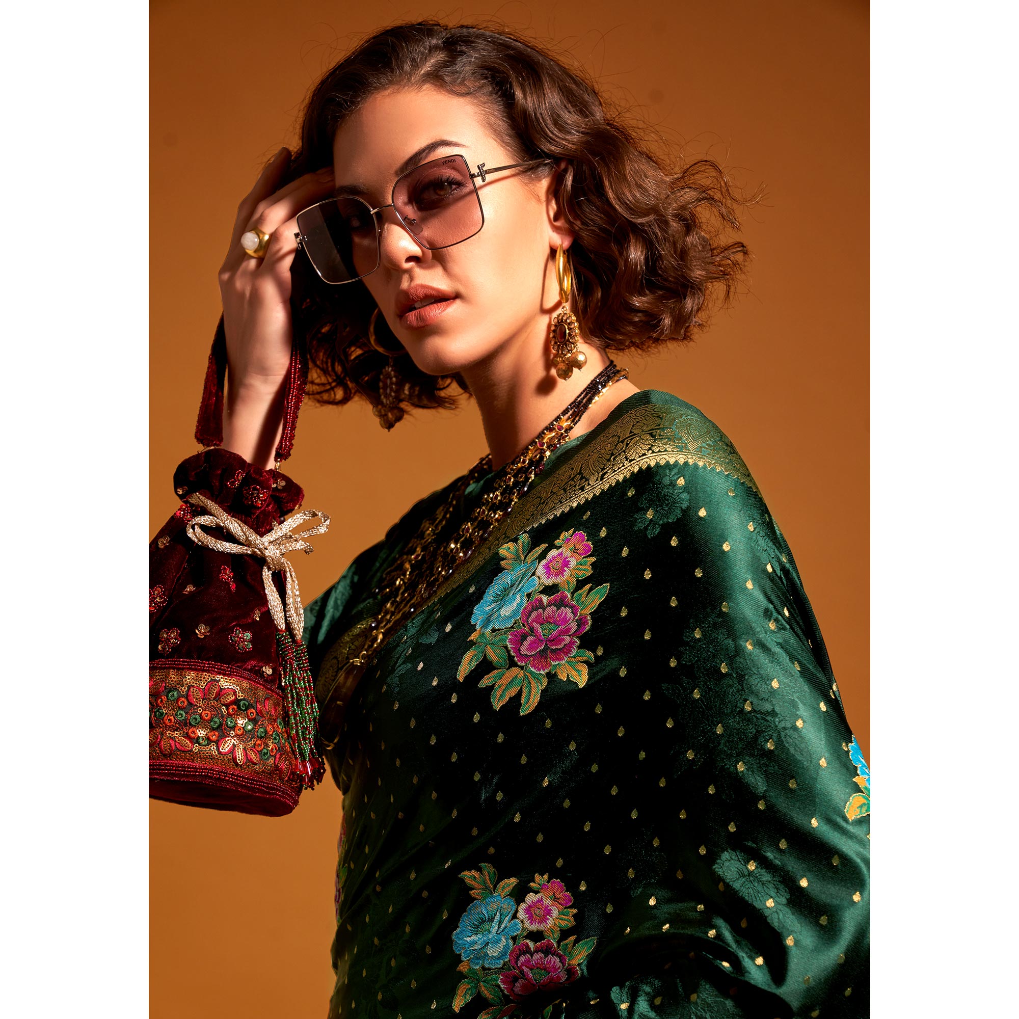 Green Floral Woven Satin Saree With Tassels