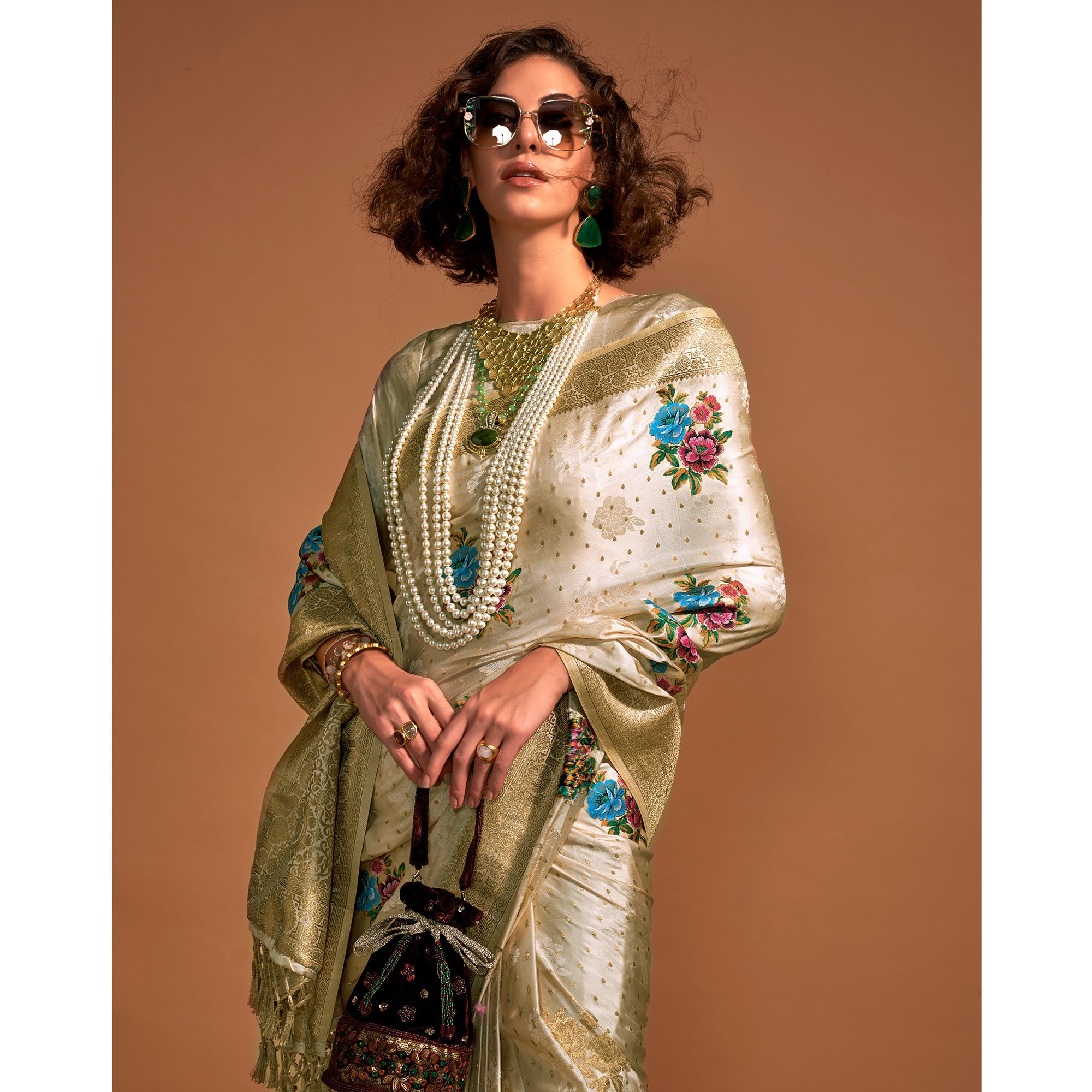 Off White Floral Woven Satin Saree With Tassels
