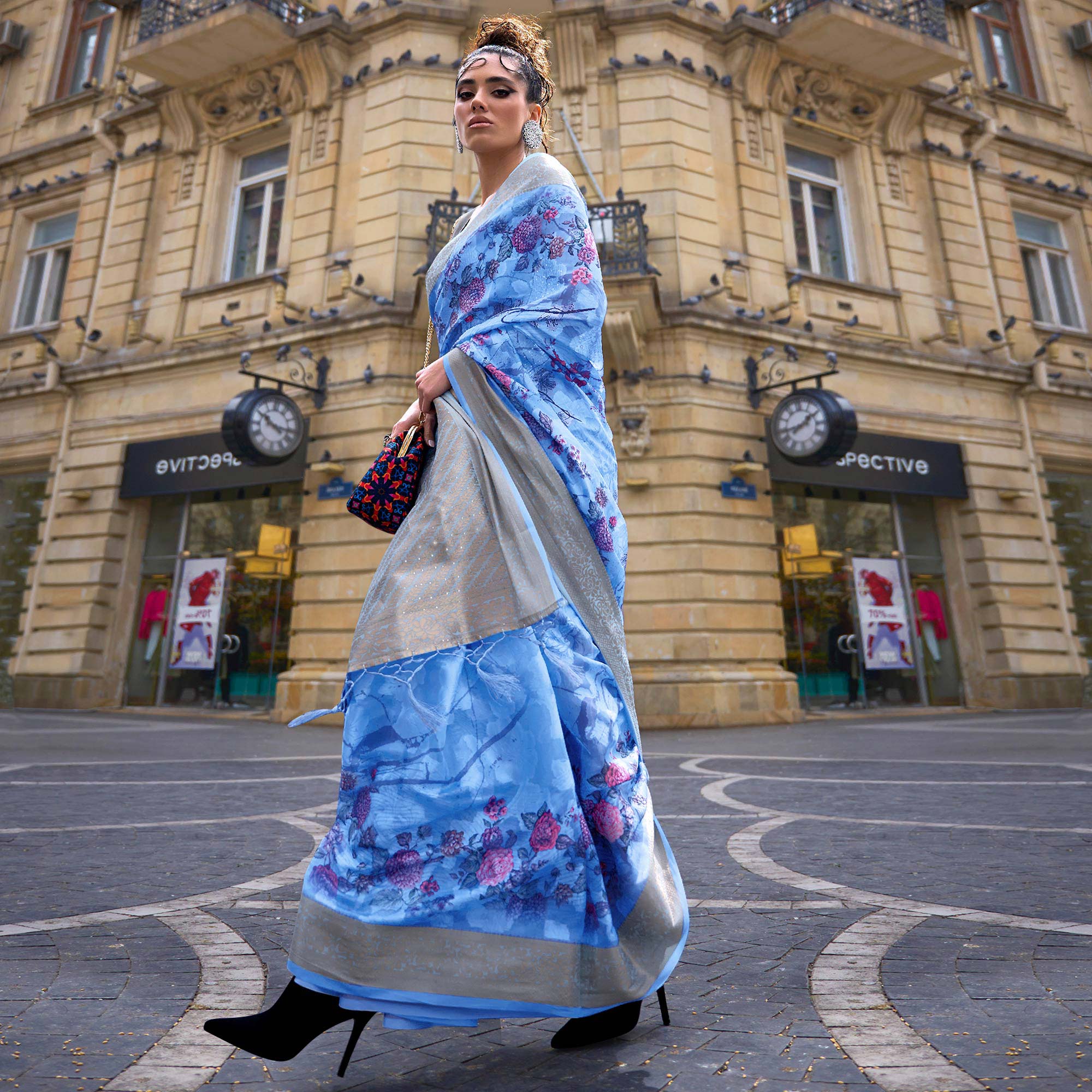 Blue Floral Woven Brasso Saree With Tassels