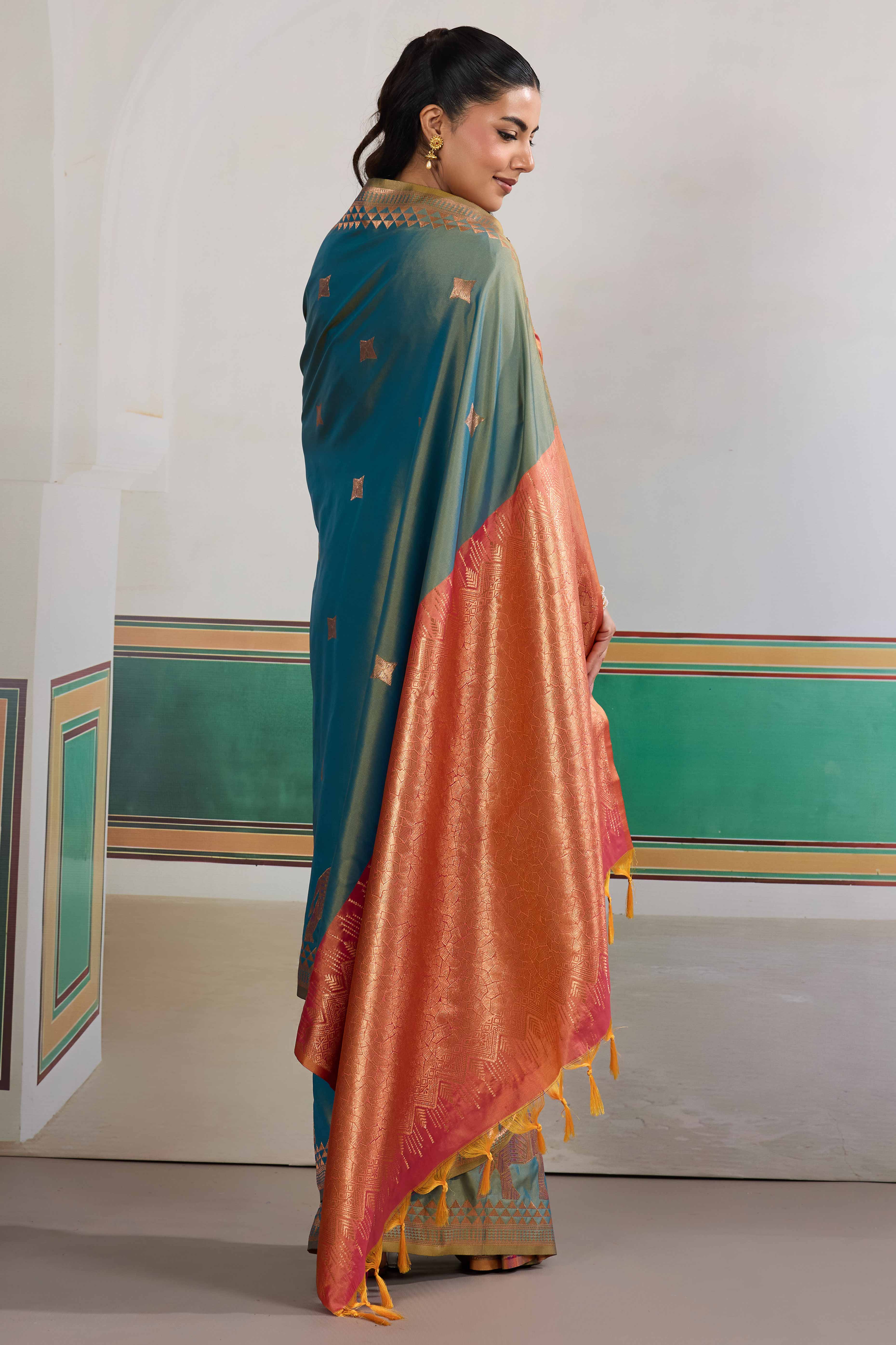 Traditional Teal Blue Pure Silk Saree Featuring Elephant Motif Zari Weaving & Tassel Pallu