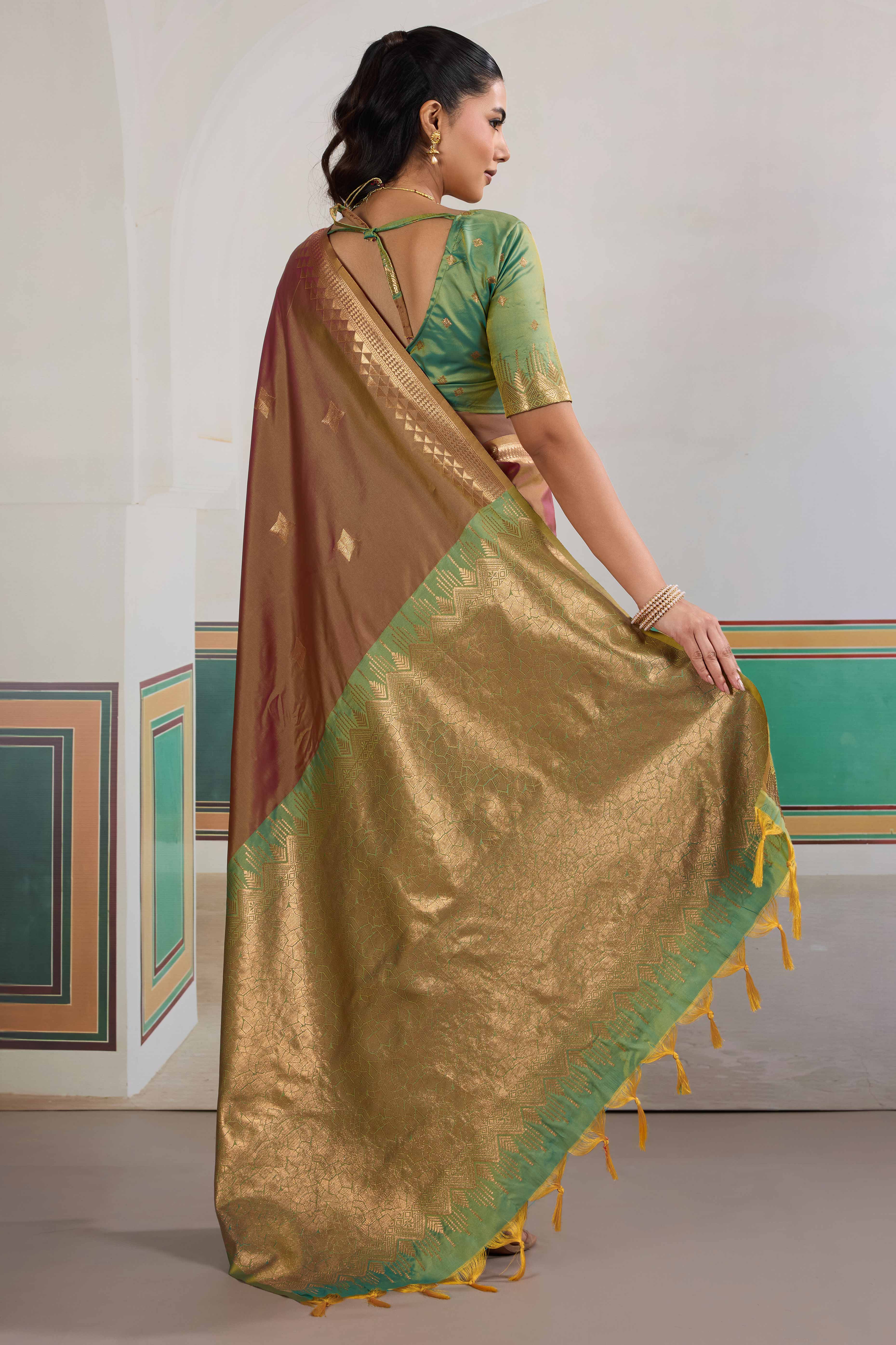 Traditional Brown Pure Silk Saree Featuring Elephant Motif Zari Weaving & Tassel Pallu