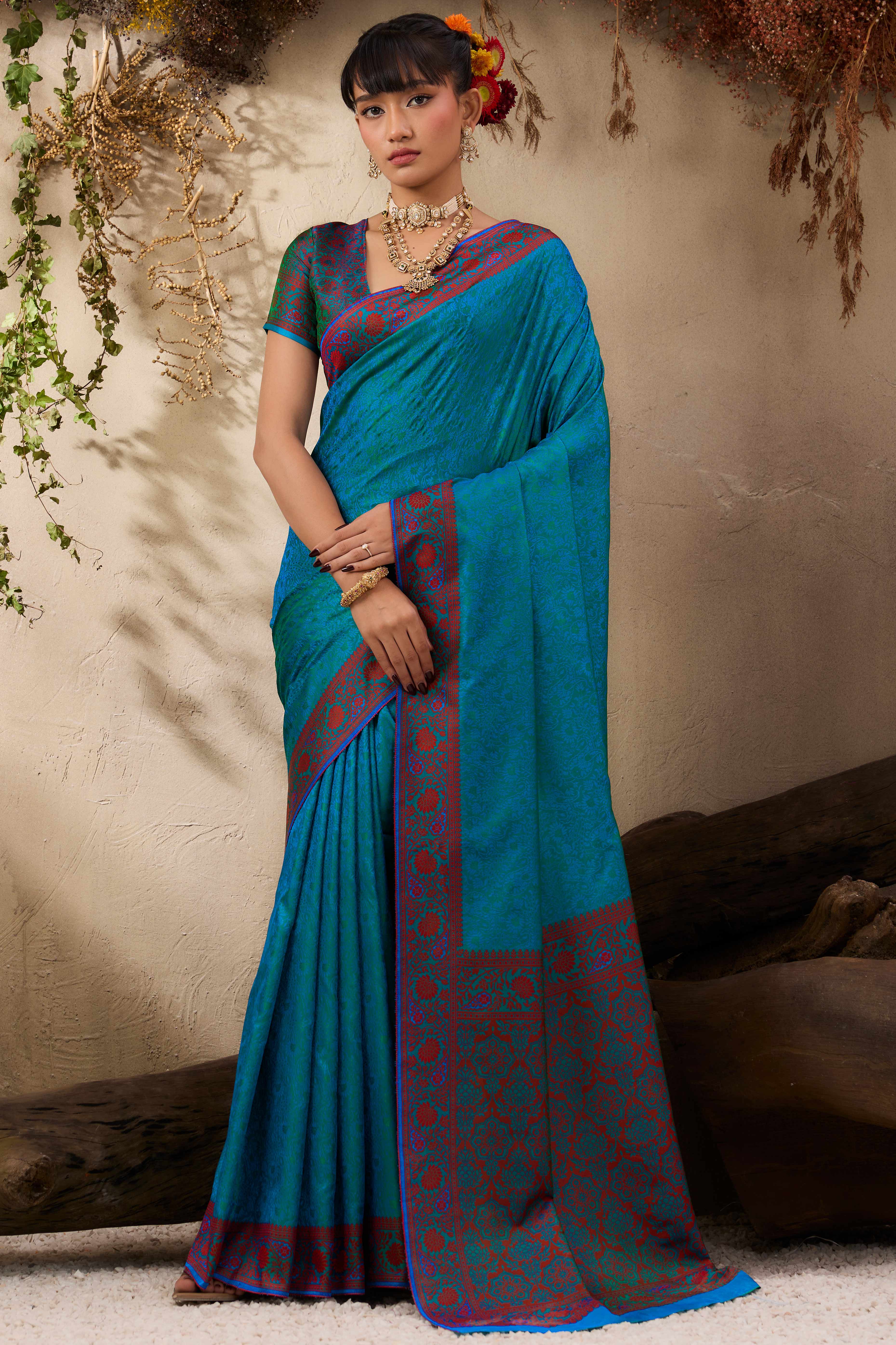 Teal Pure Silk Kanjivaram Handloom Saree Enhanced with Zari Woven Patterns