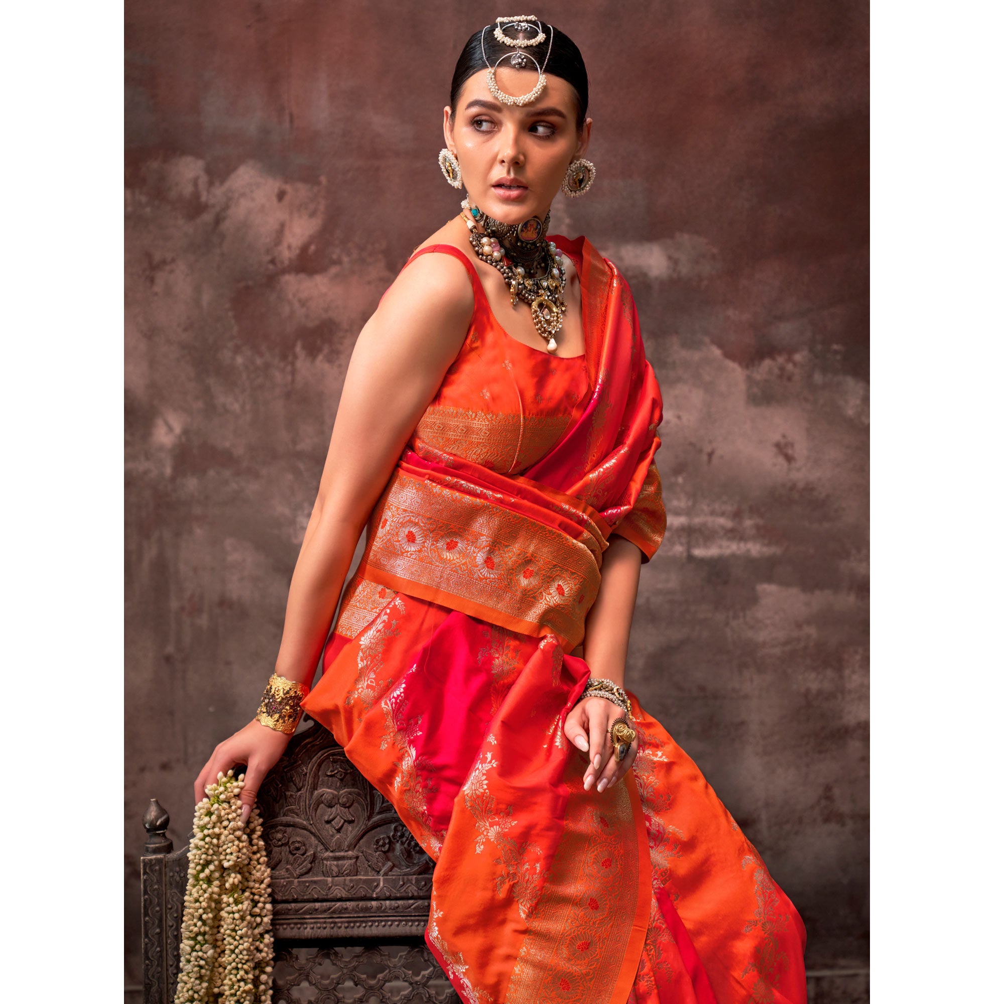 Orange Floral Woven Art Silk Saree With Tassels