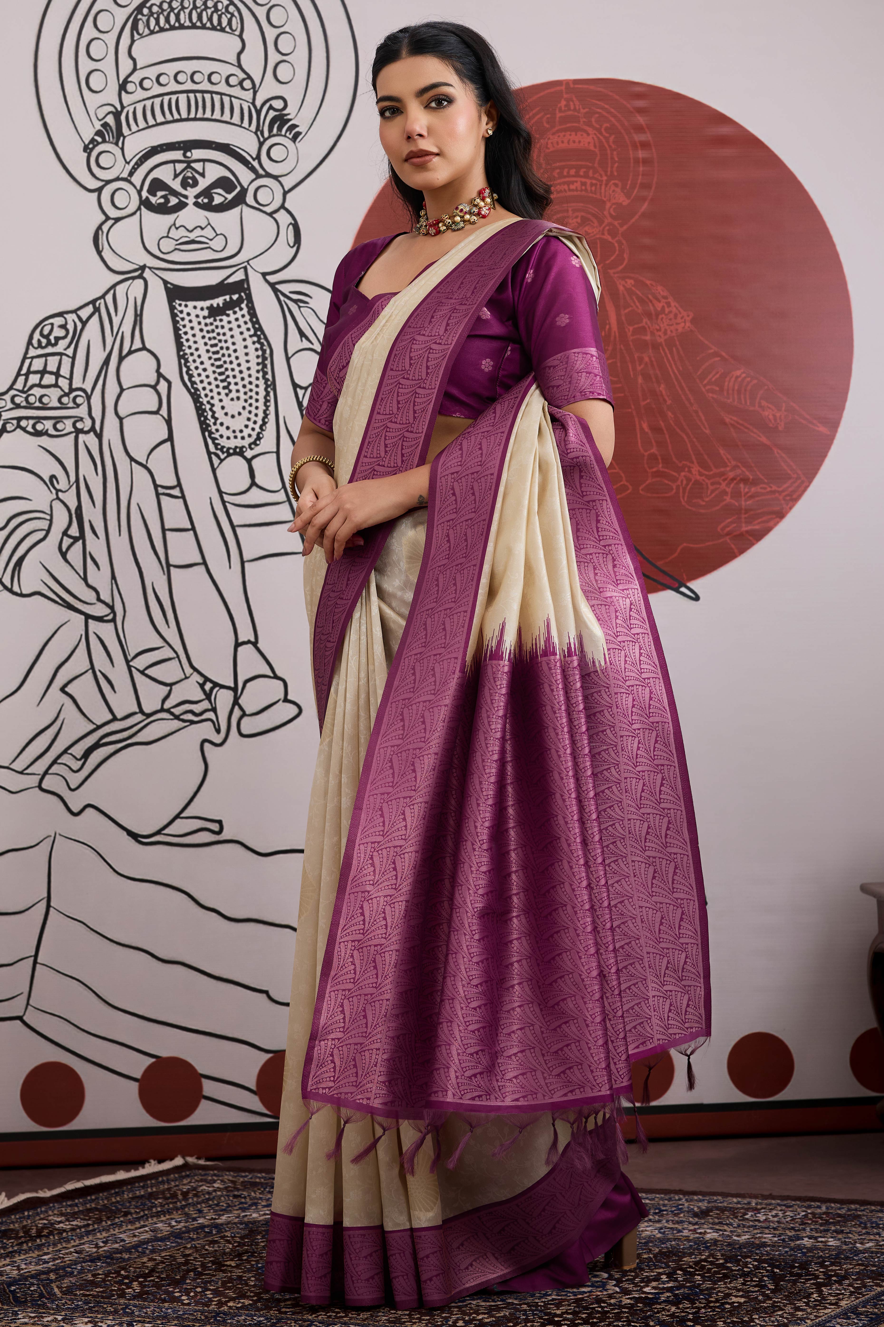 Graceful Cream & Purple Zari Weaving Silk Saree Highlighted By Decorative Tassel Pallu