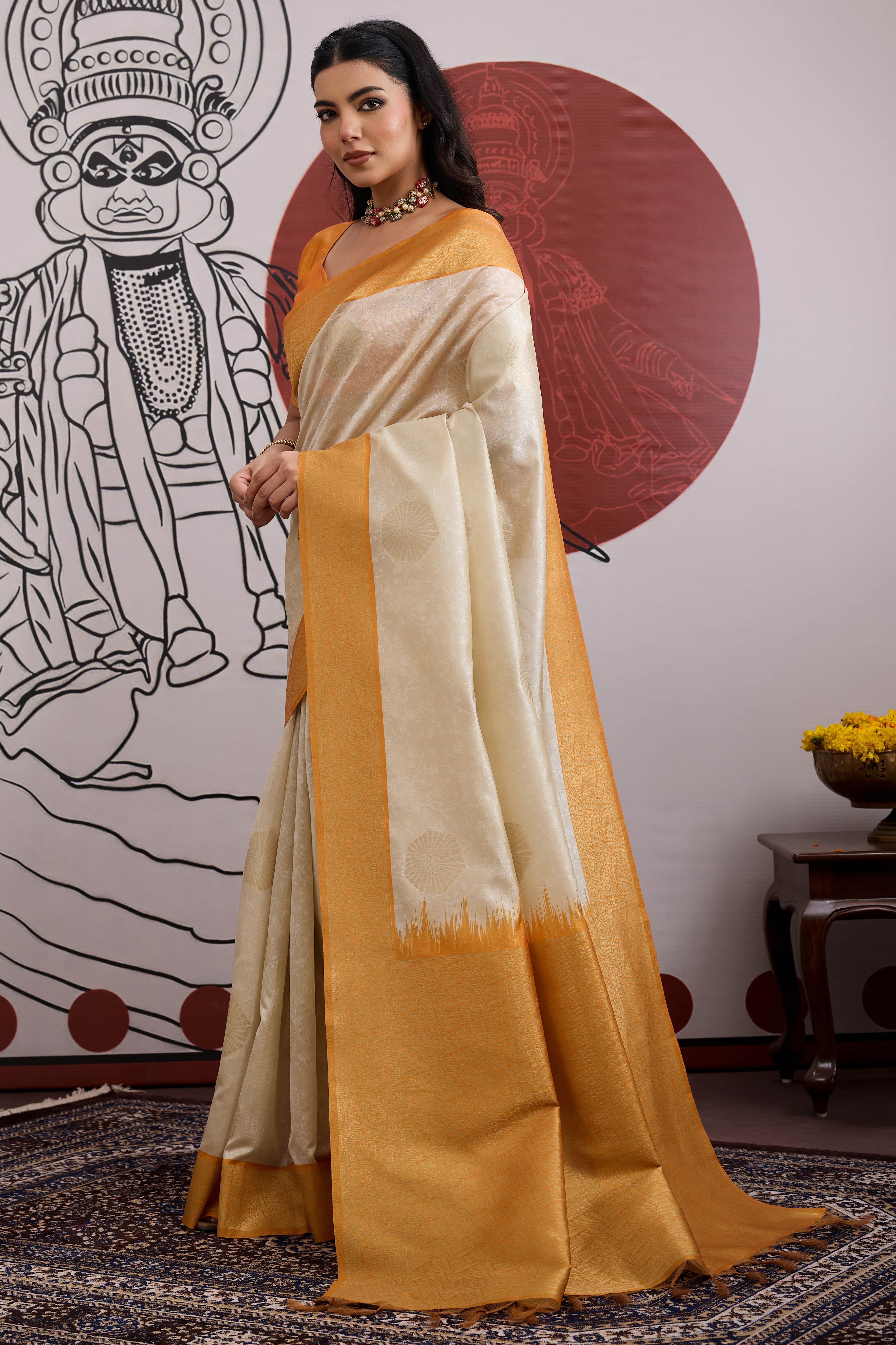 Graceful Cream & Mustard Zari Weaving Silk Saree Highlighted By Decorative Tassel Pallu