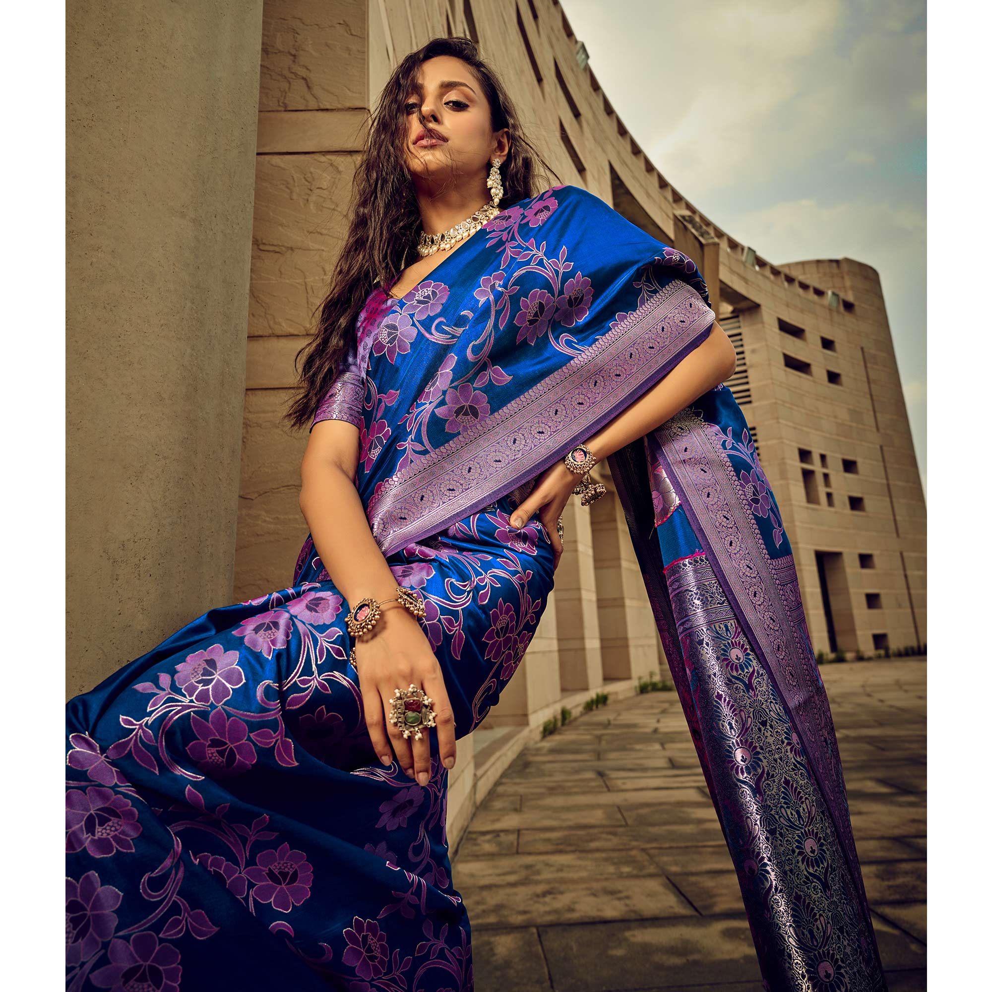 Blue Floral Woven Satin Saree With Tassels