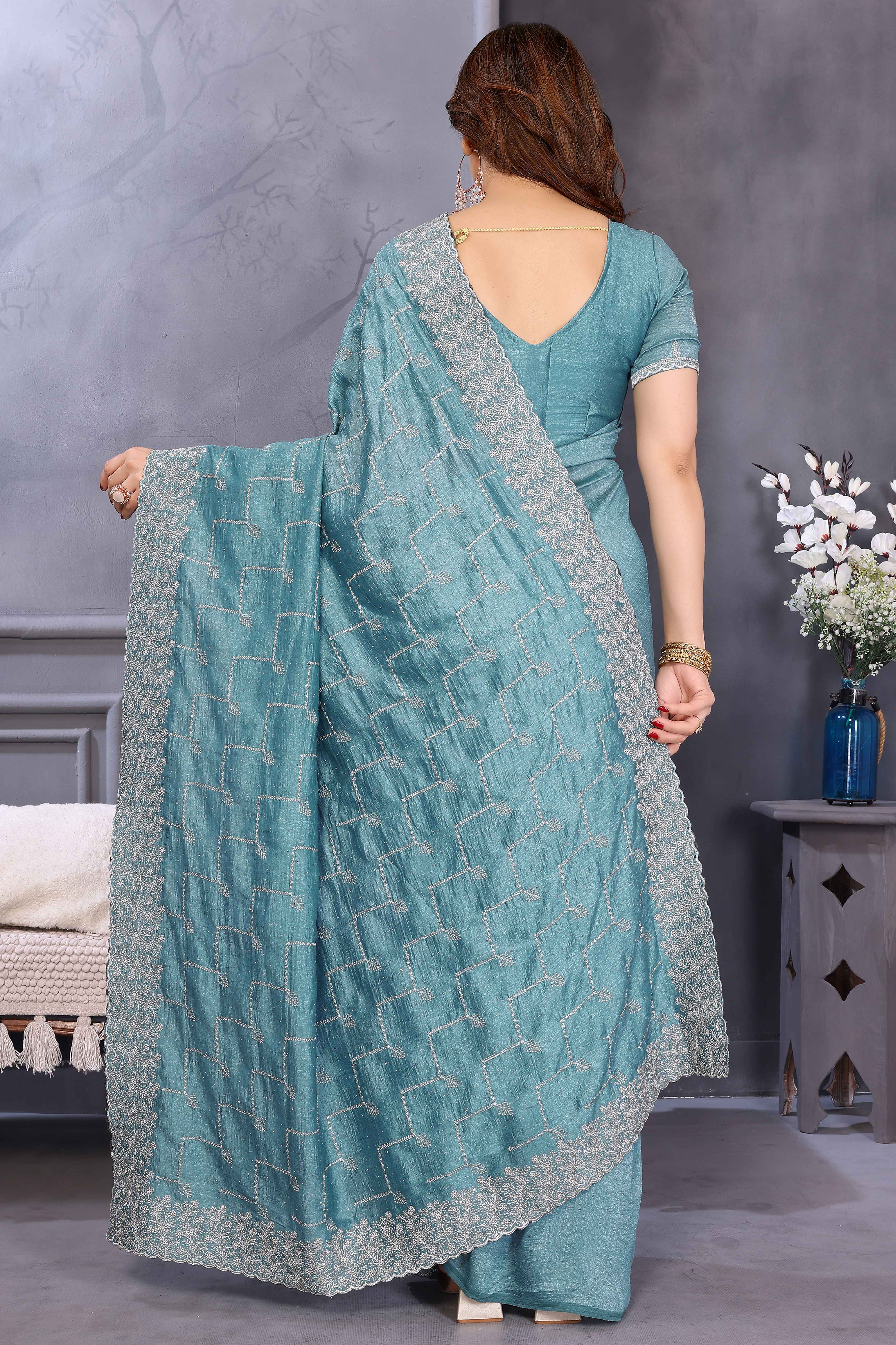 Refreshing Aqua Blue Vichitra Silk Saree with Traditional Zari Embroidery and Stone Embellishments