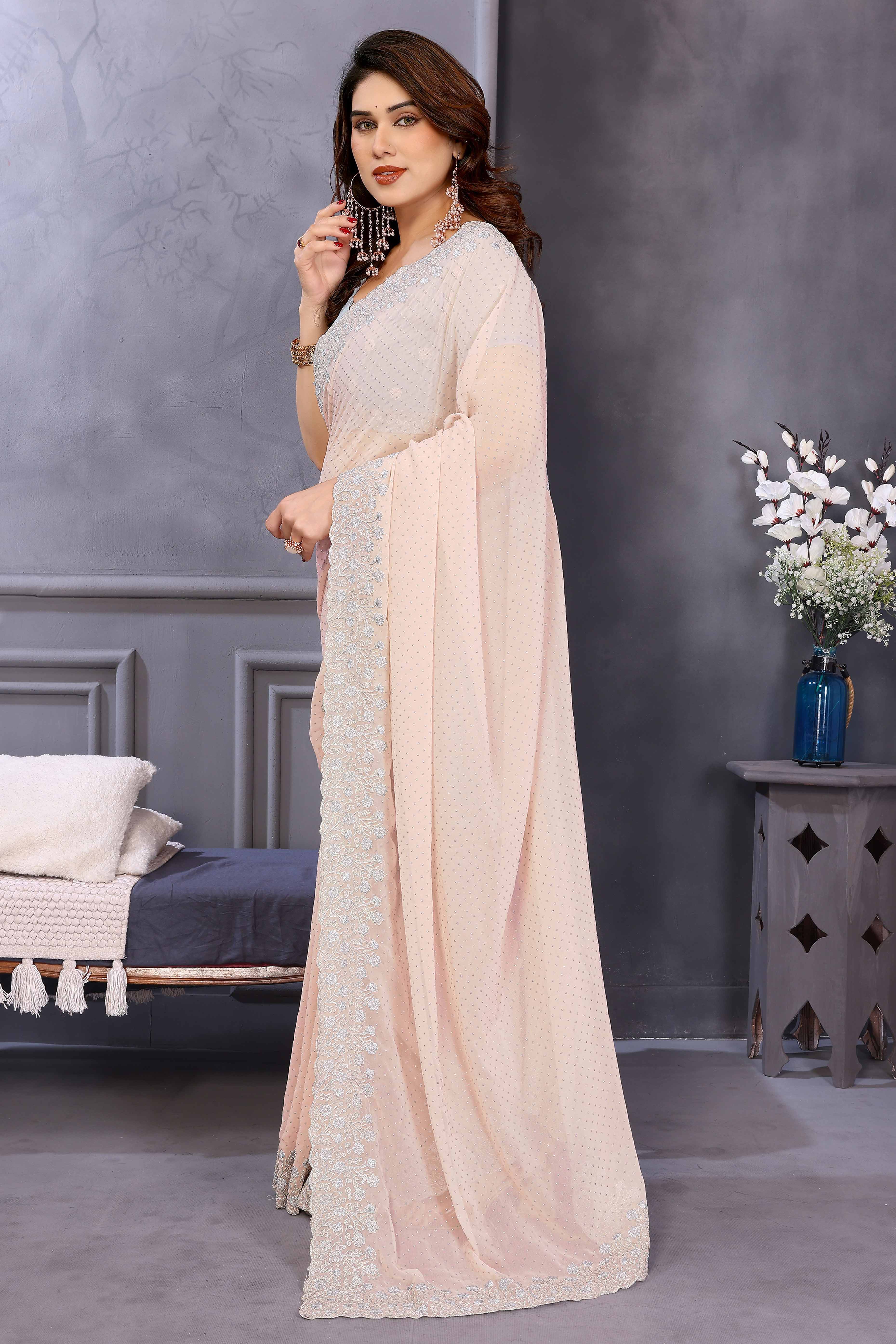Soft Peach Georgette Saree with Subtle Zari Embroidery