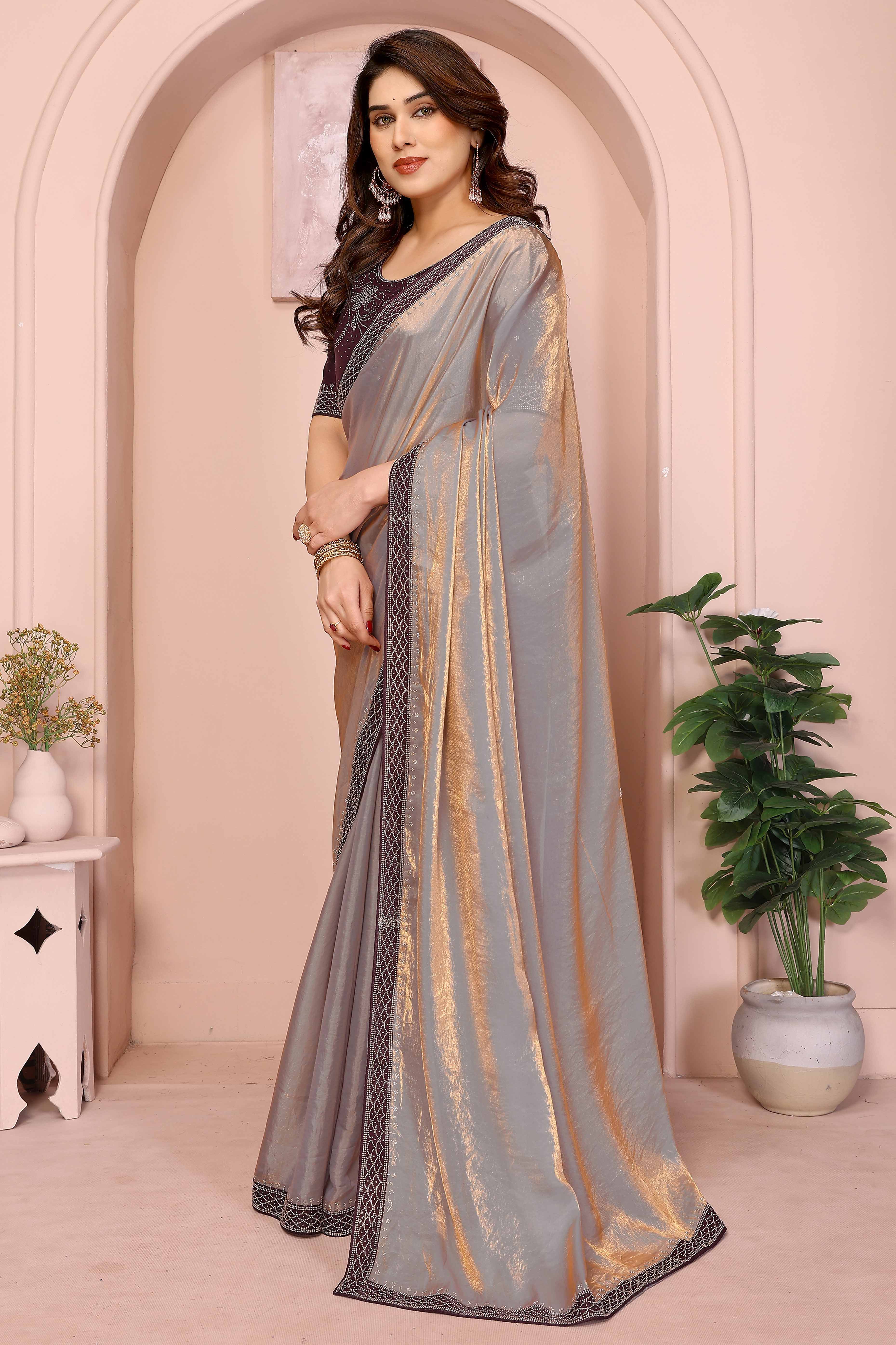 Grey Fancy Satin Saree Featuring a Solid Body and Sparkling Jarkan Work on the Edges