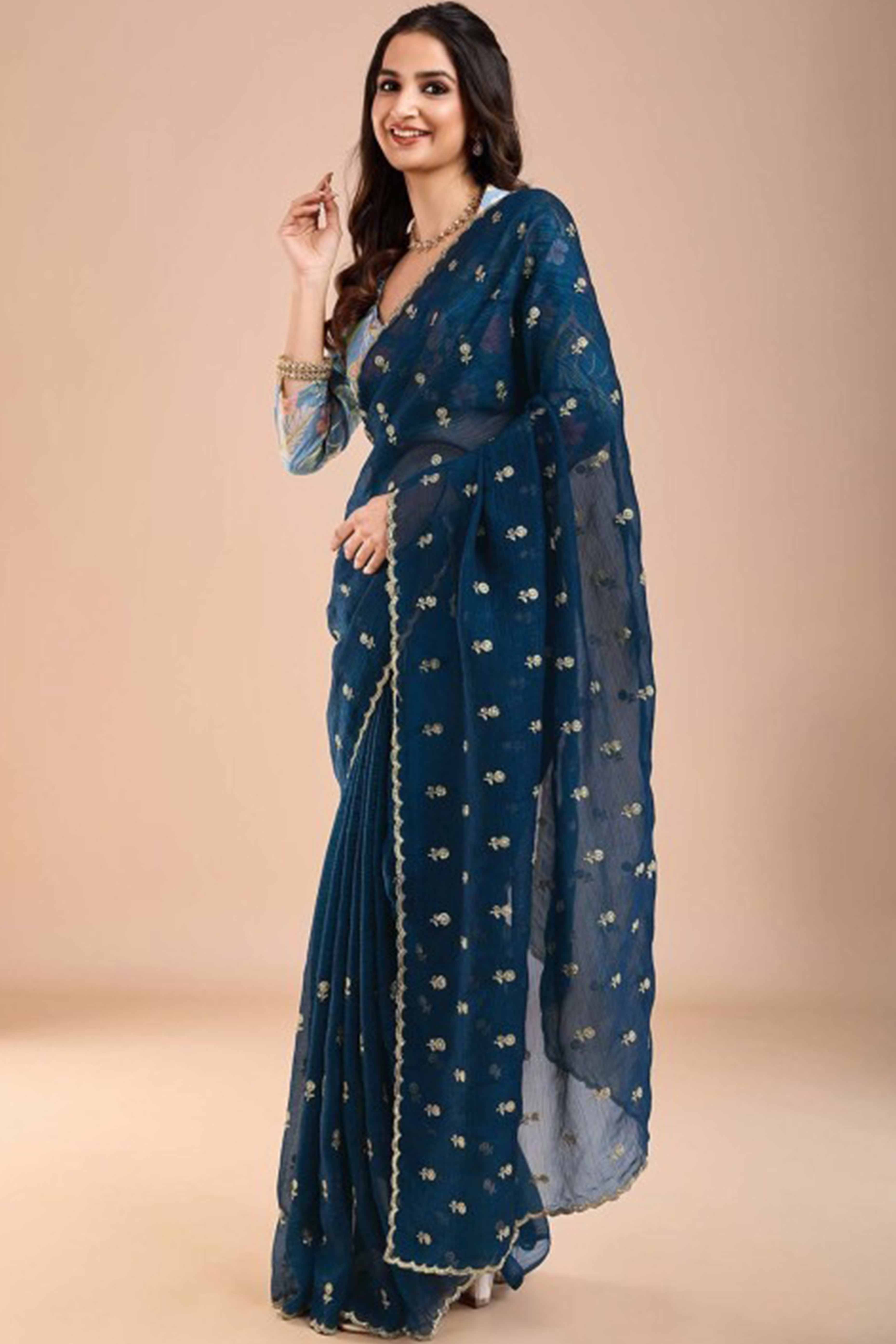 Blue Crunchy Saree Adorned With Floral Sequins Embroidery & Graceful Border Finish