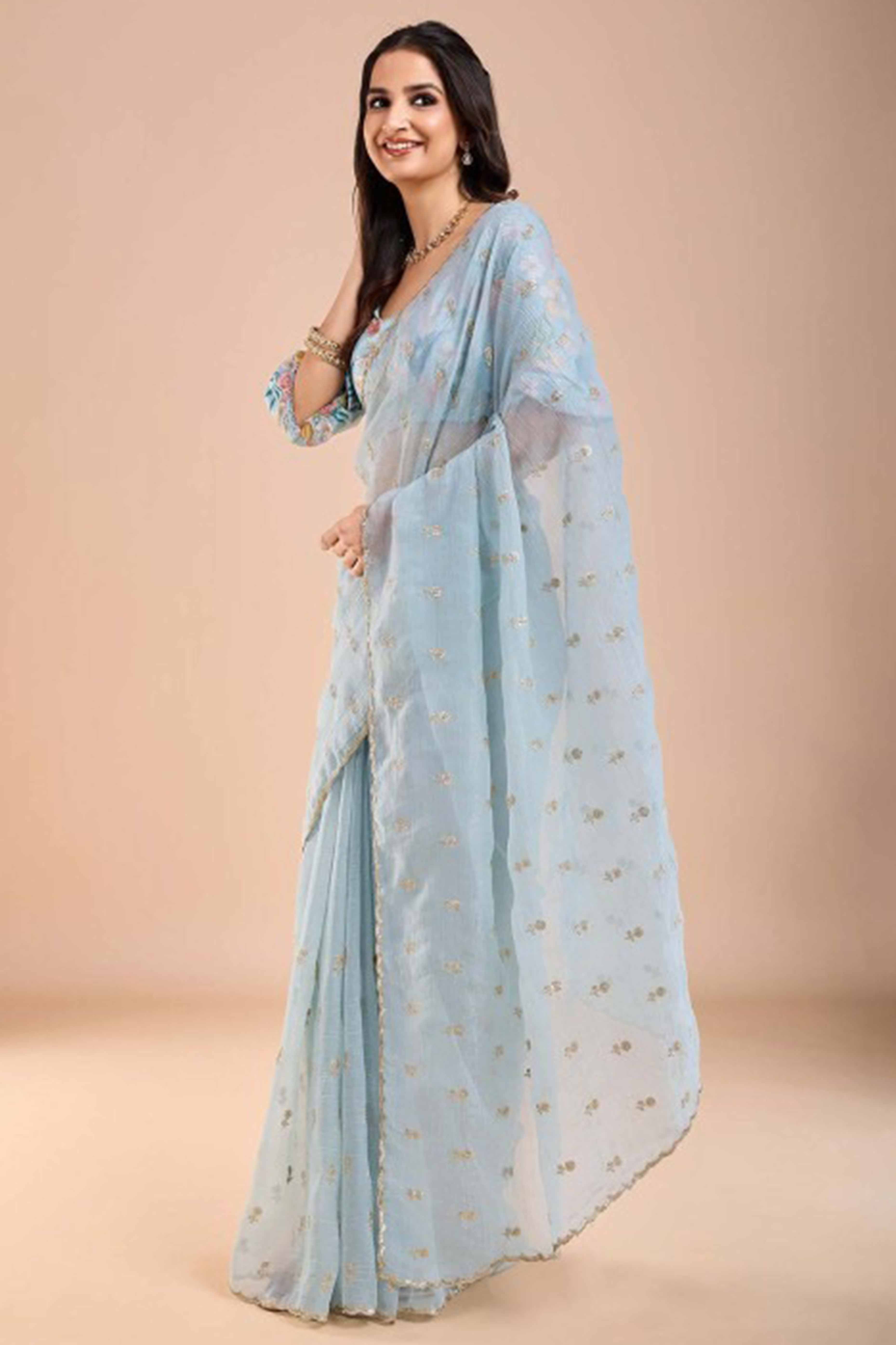 Light Blue Crunchy Saree Adorned With Floral Sequins Embroidery & Graceful Border Finish