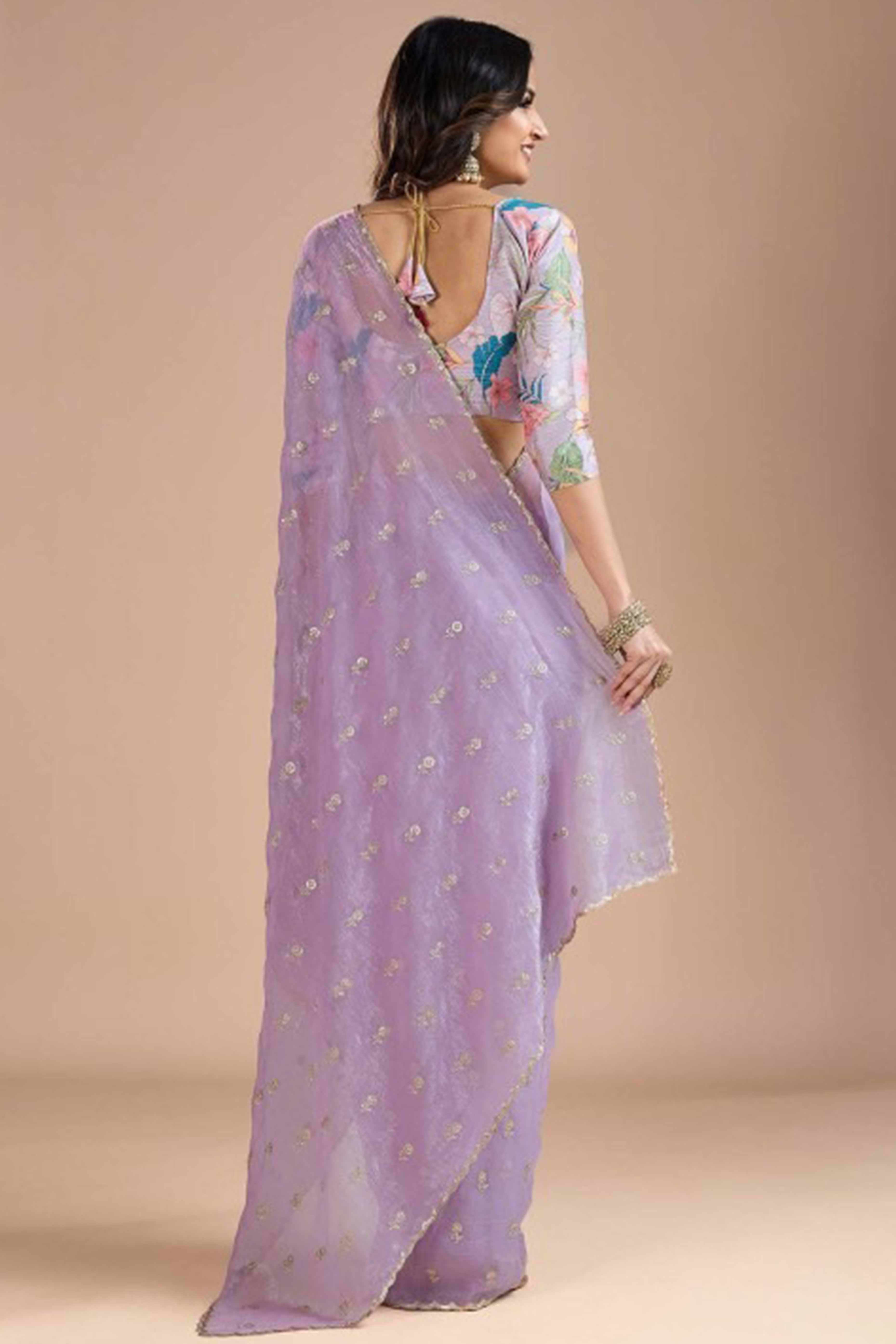 Lavender Crunchy Saree Adorned With Floral Sequins Embroidery & Graceful Border Finish