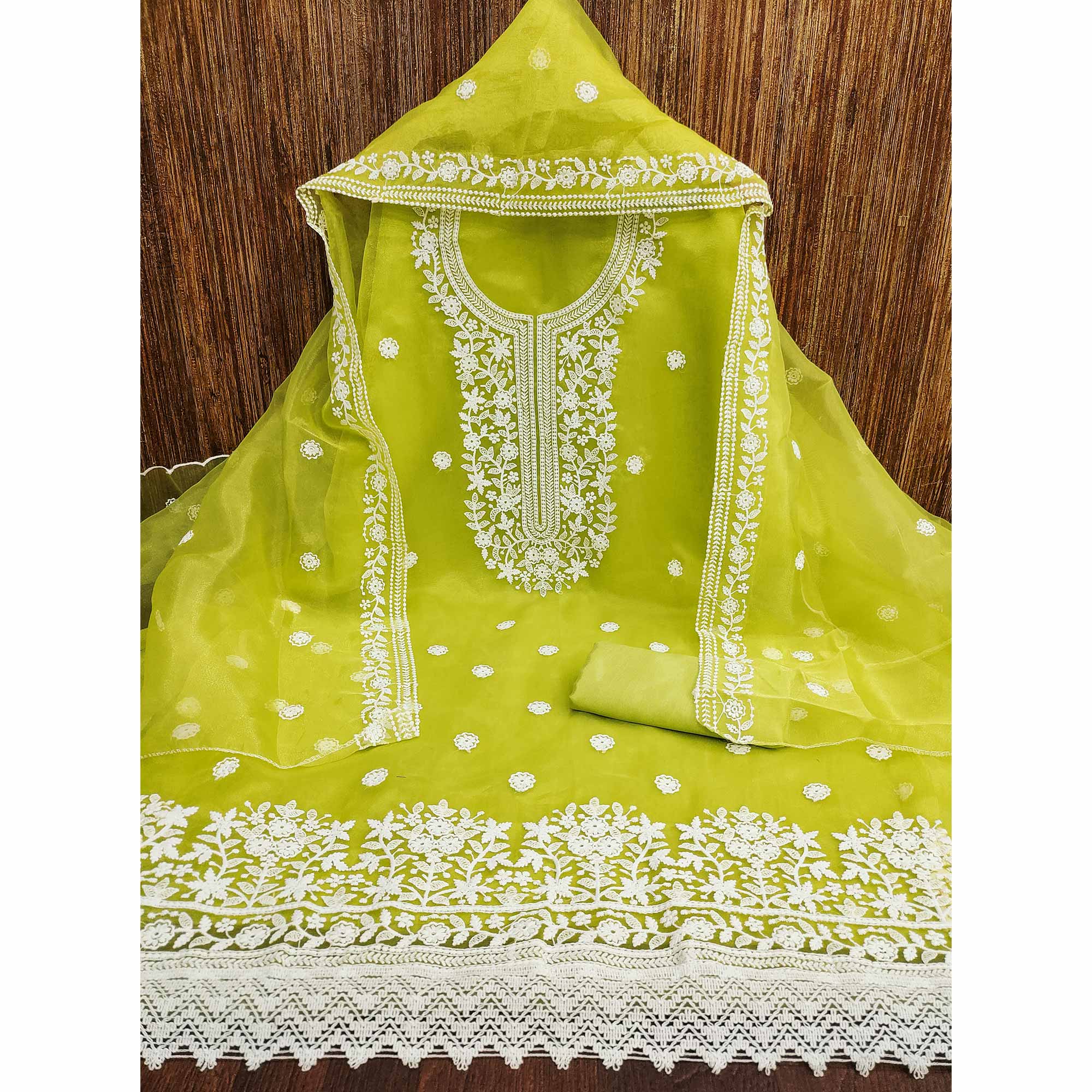 Unleash Your Style With This Green Floral Thread Embroidered Organza Dress Material