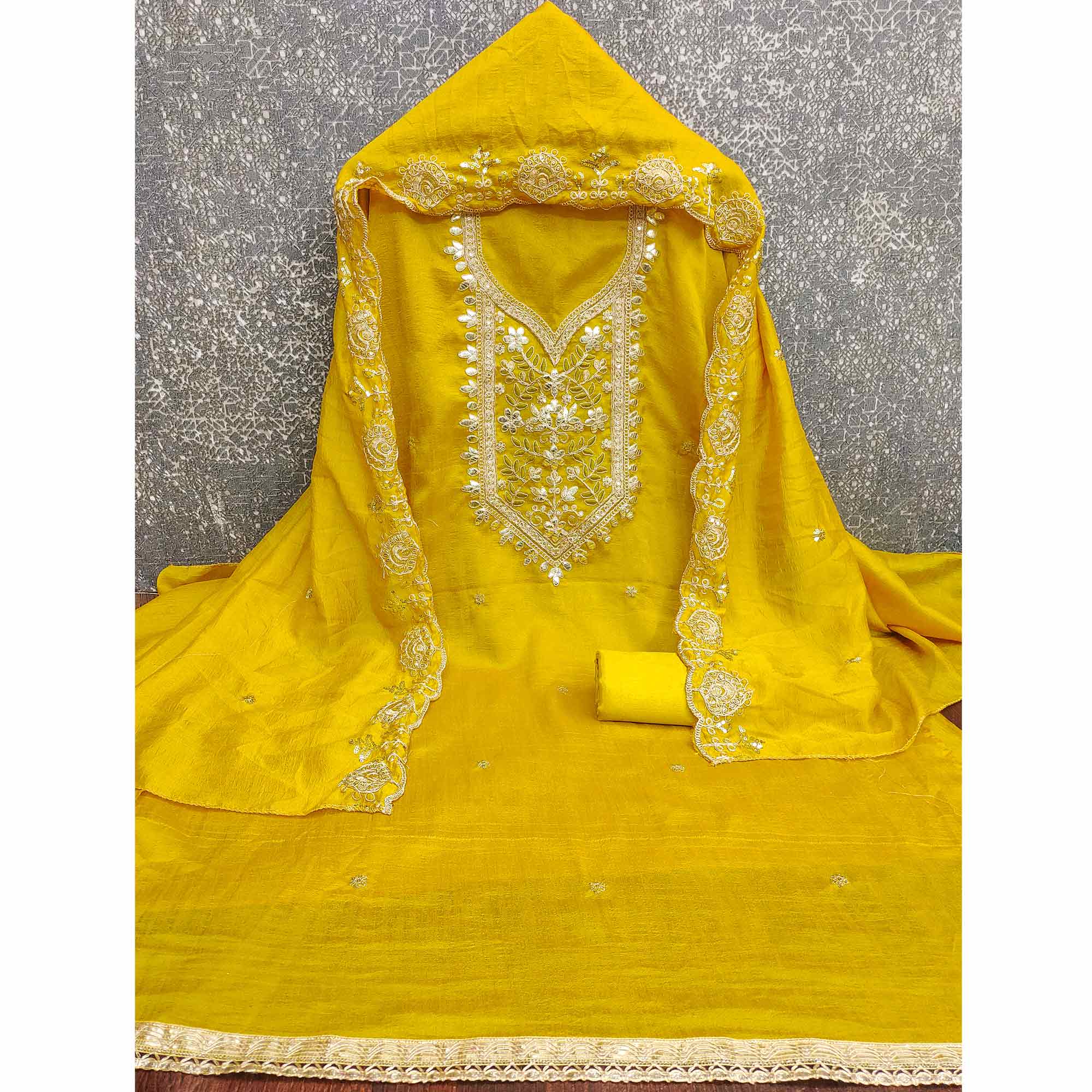 Timeless Mustard Floral Embroidered Vichitra Silk Dress Material Highlighted With Gota Patti Work
