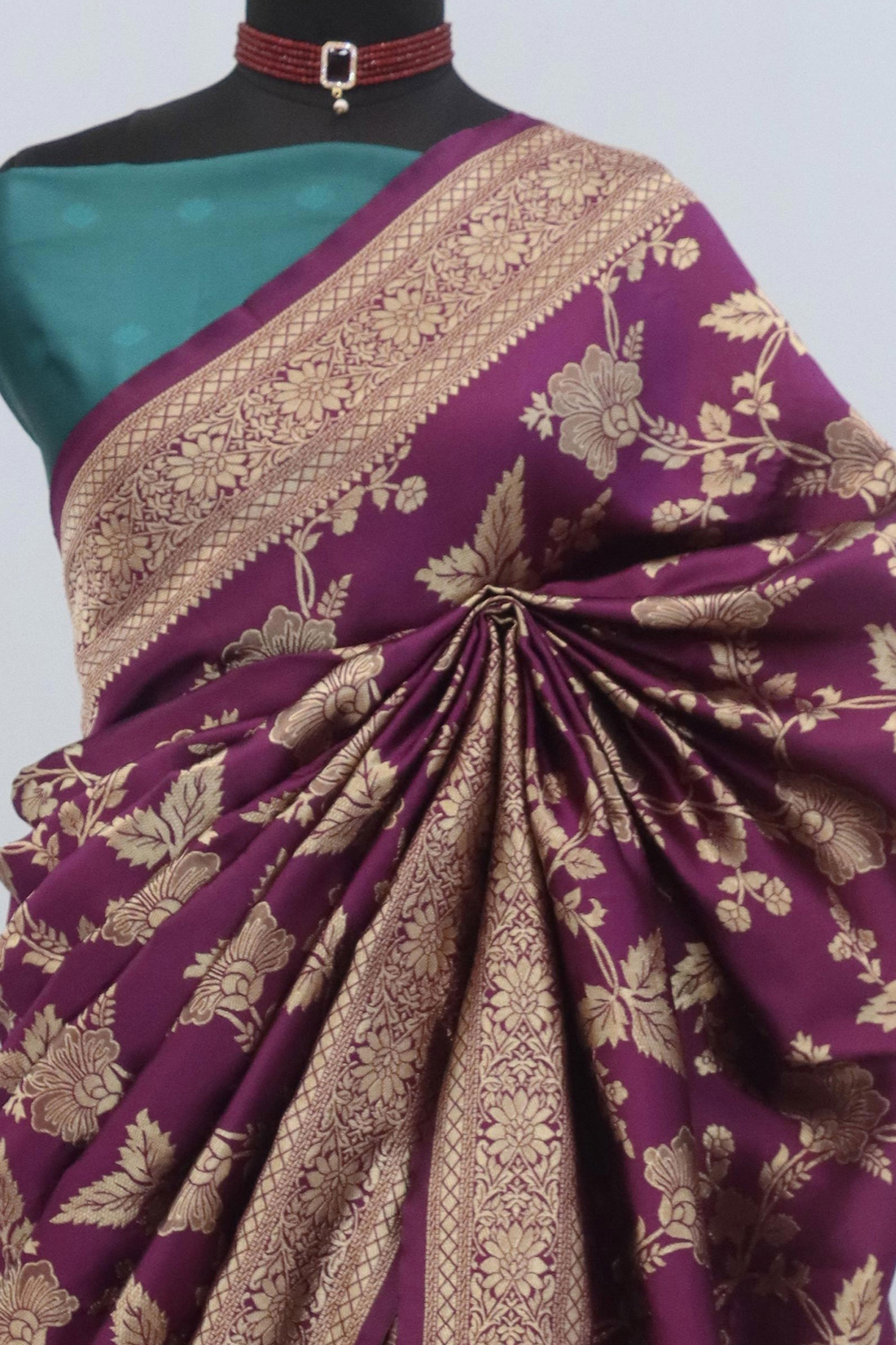 Graceful Wine & Rama Banarasi Silk Saree Featuring Intricate Floral Zari Weaving Work