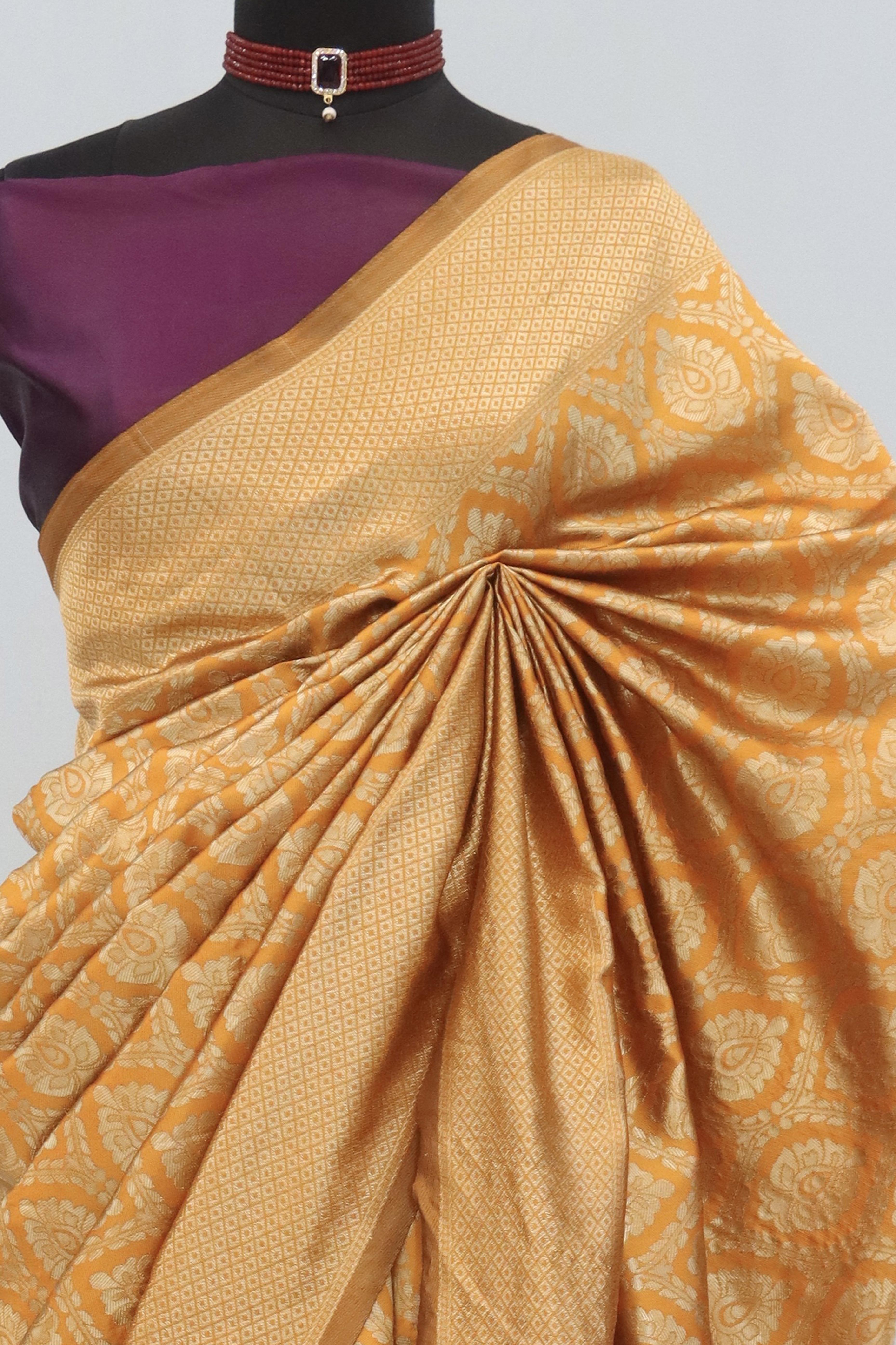 Charming Orange & Purple Banarasi Silk Saree Adorned With Floral Zari Weaving