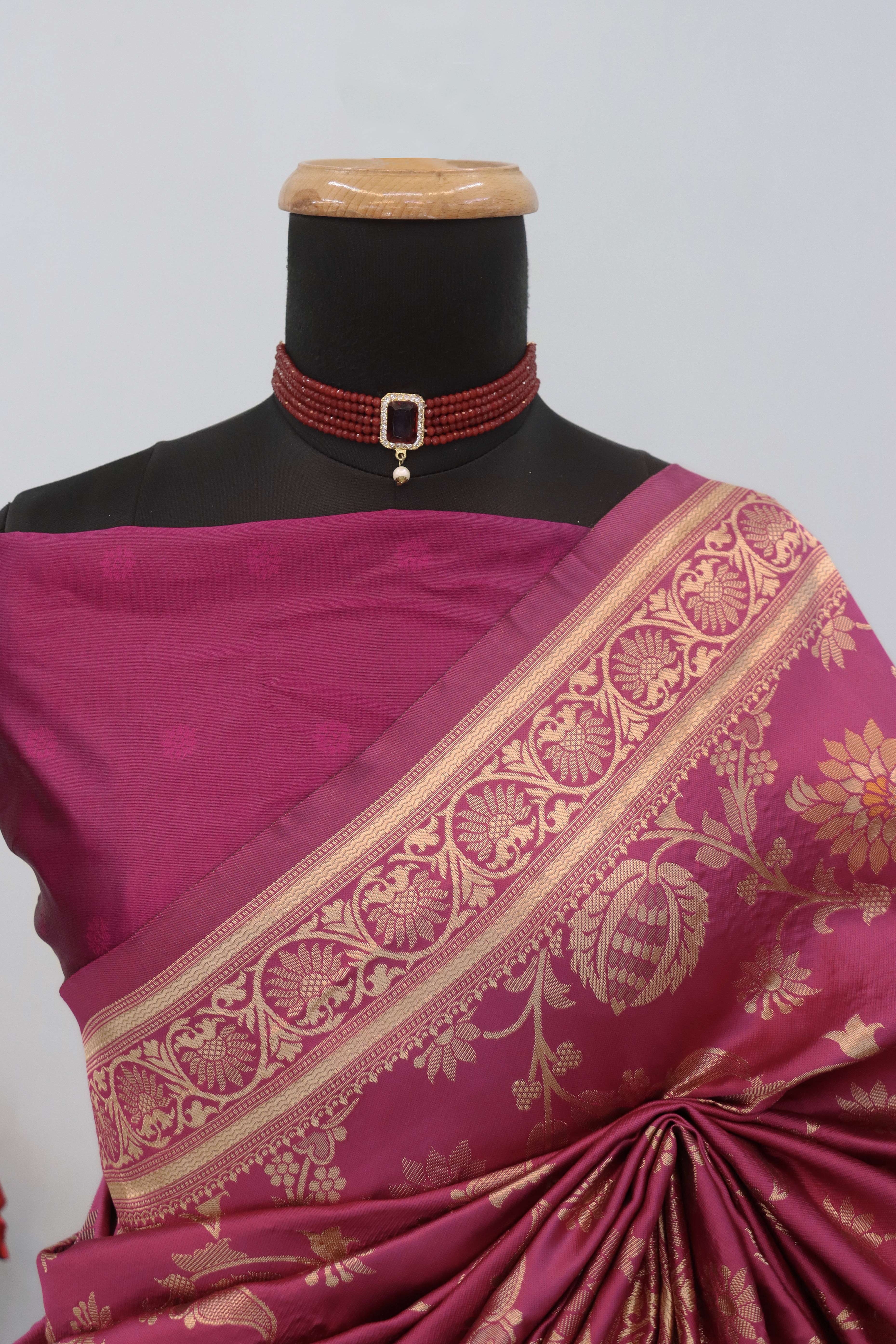 Charming Rani Pink Banarasi Silk Saree Adorned With Floral Zari Weaving