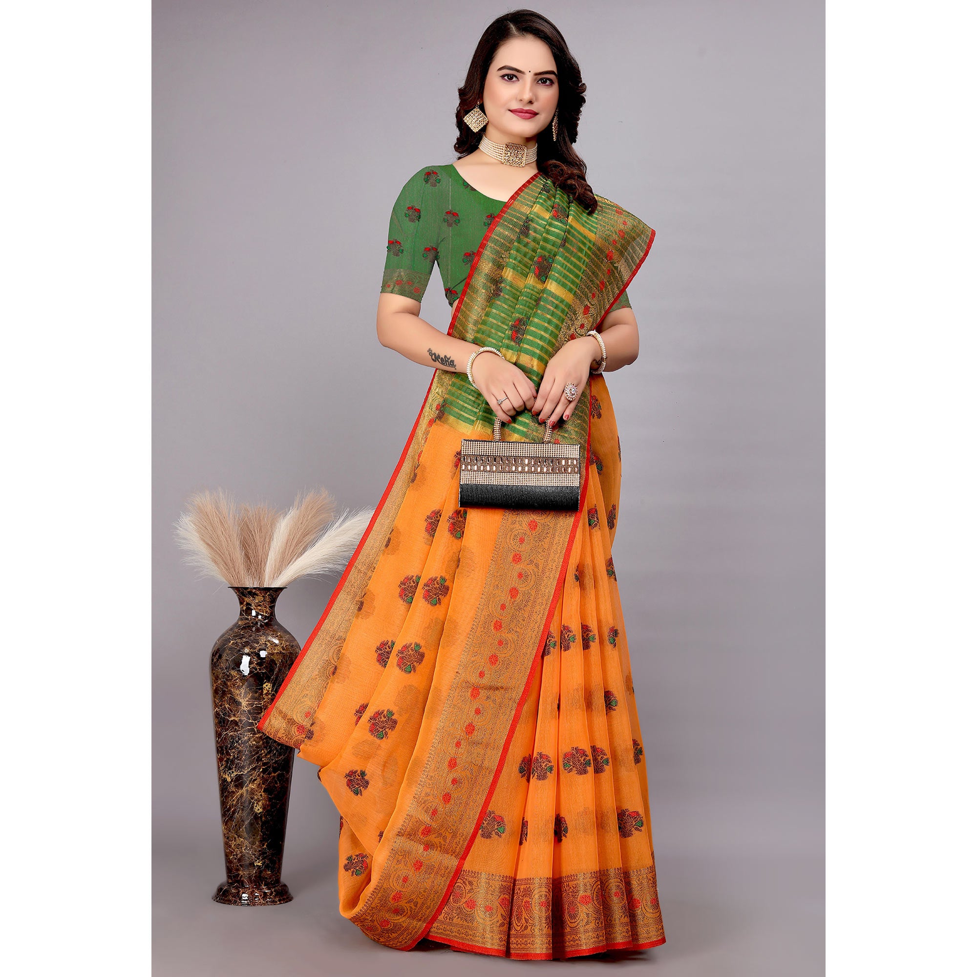 Orange Floral Woven Cotton Silk Saree With Tassels