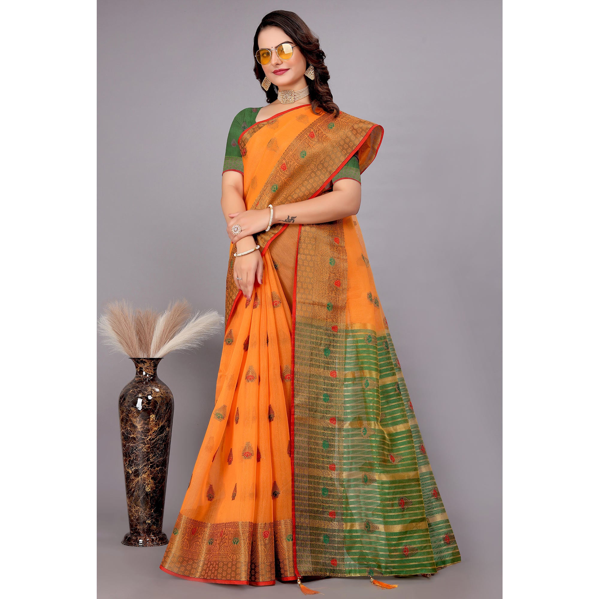 Orange Floral Woven Cotton Silk Saree With Tassels