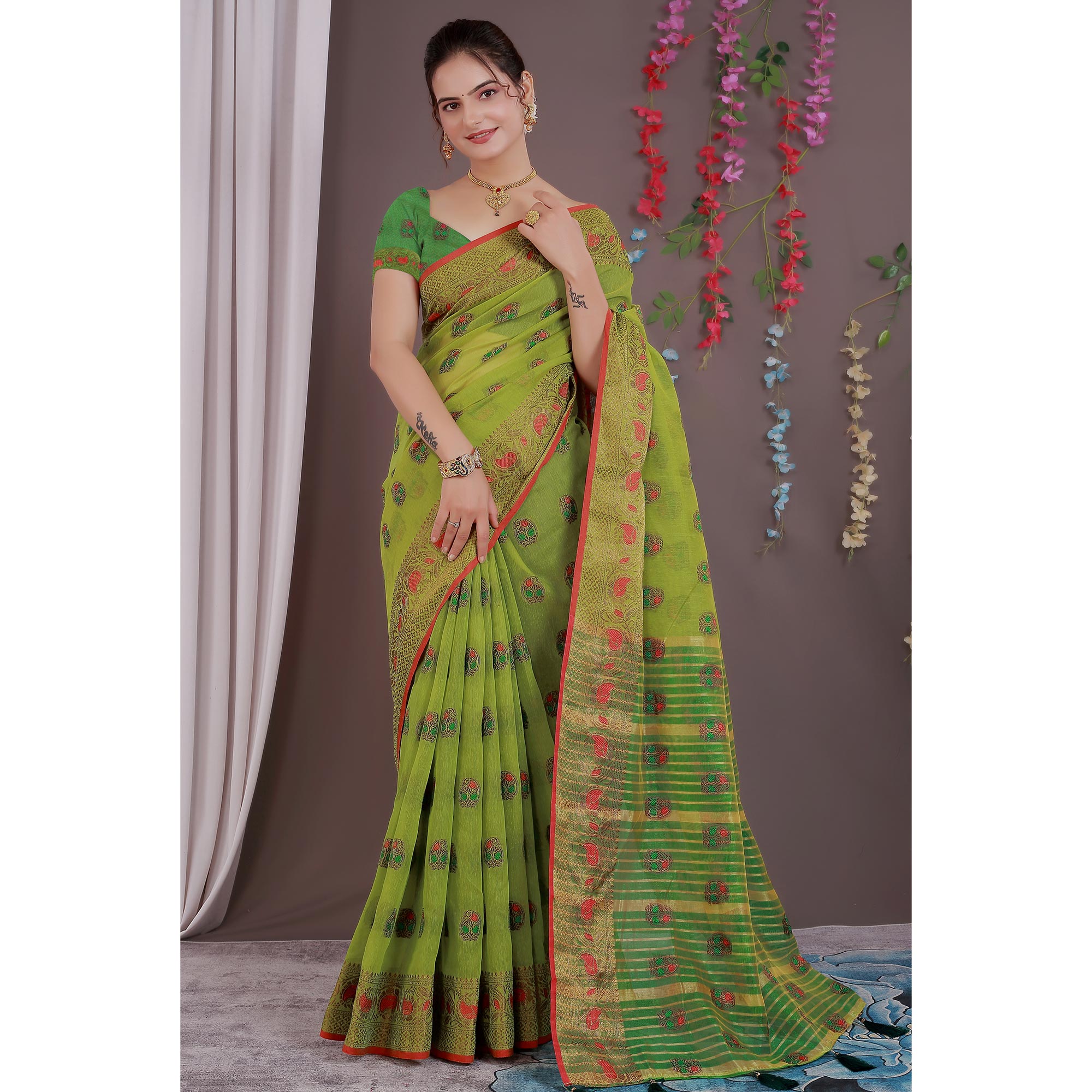 Green Floral Woven Cotton Silk Saree With Tassels