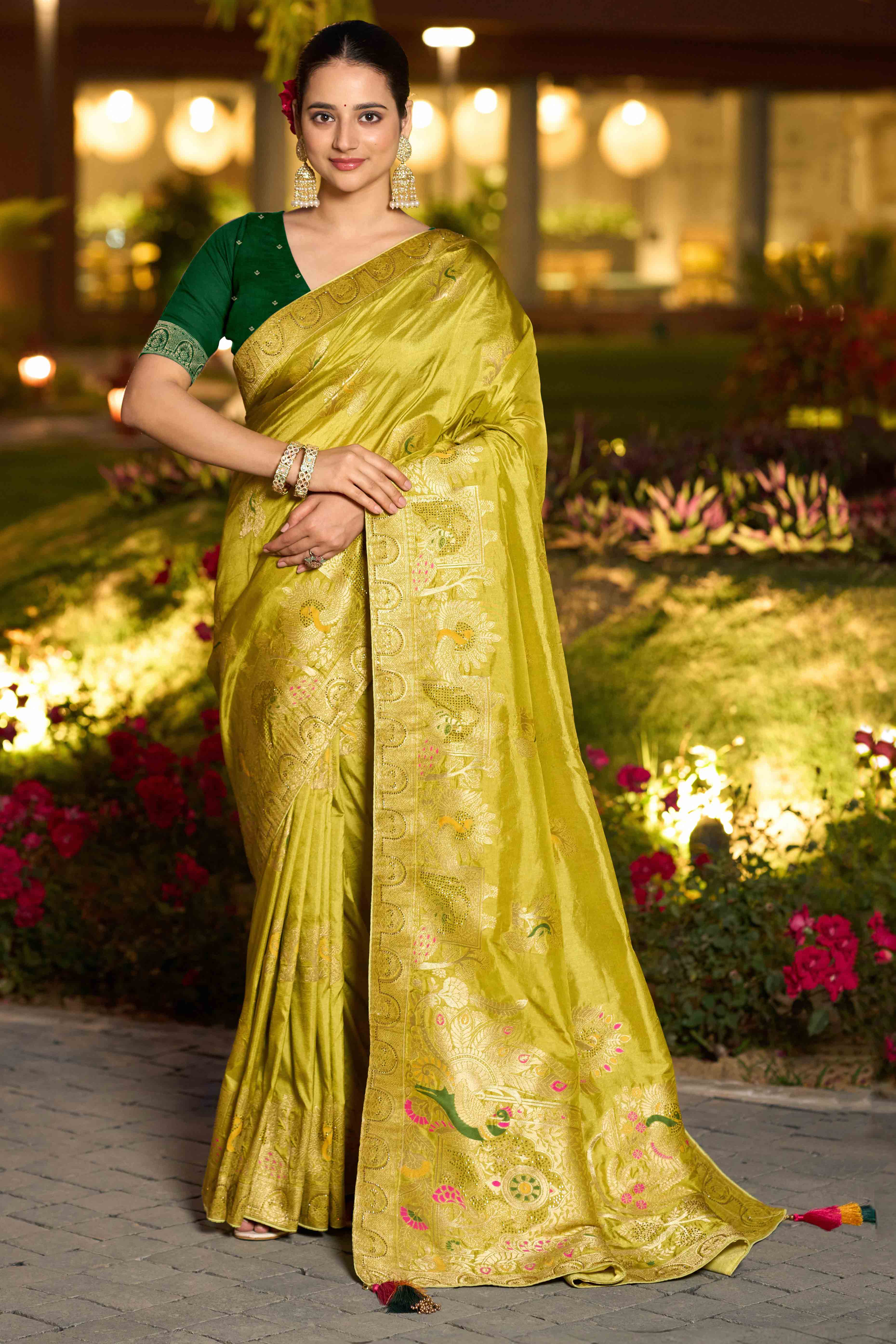Graceful Green Dola Silk Saree With Intricate Zari Weaving & Sparkling Swarovski Accents