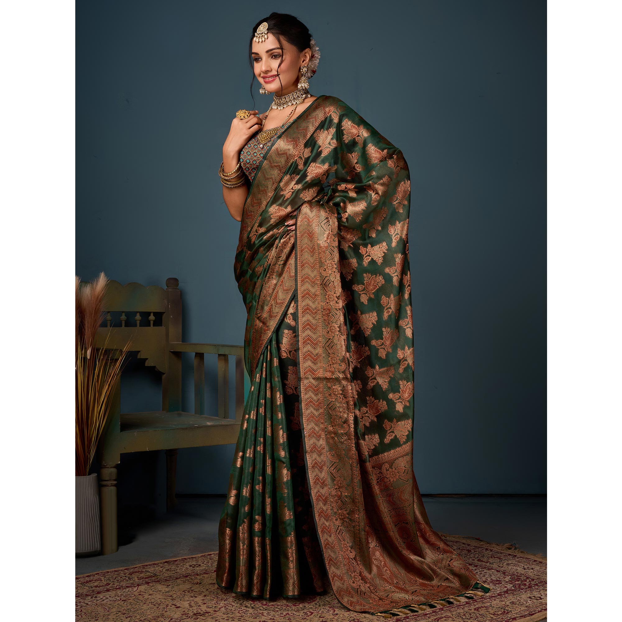 Bottle Green Floral Woven Organza Saree With Tassels